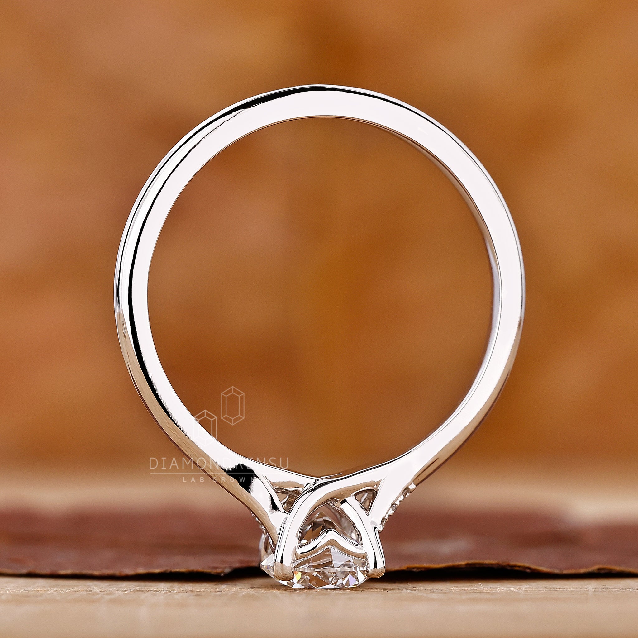 Trellis diamond ring with round diamond ring

