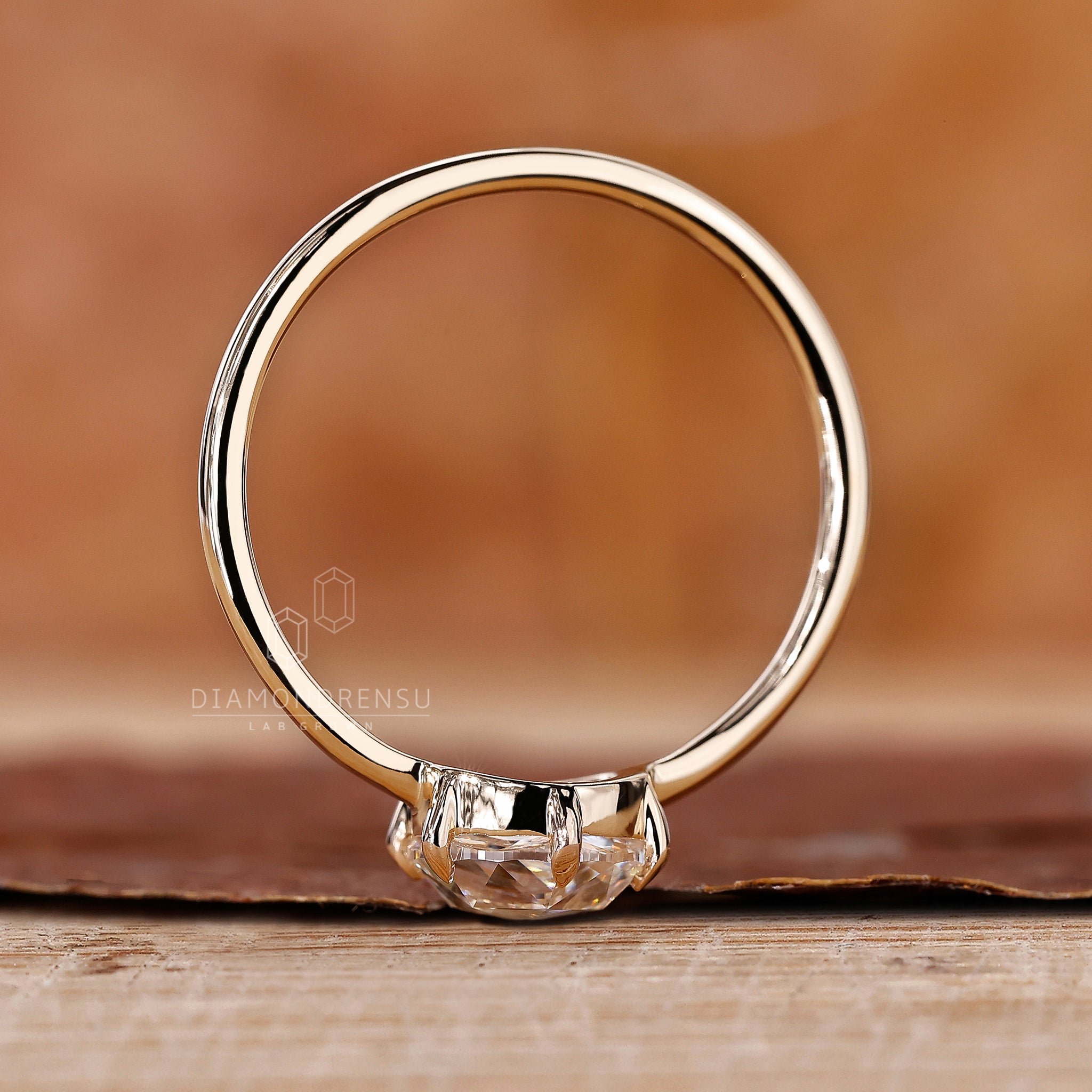 Handmade jewellery featuring a rose cut solitaire diamond.
