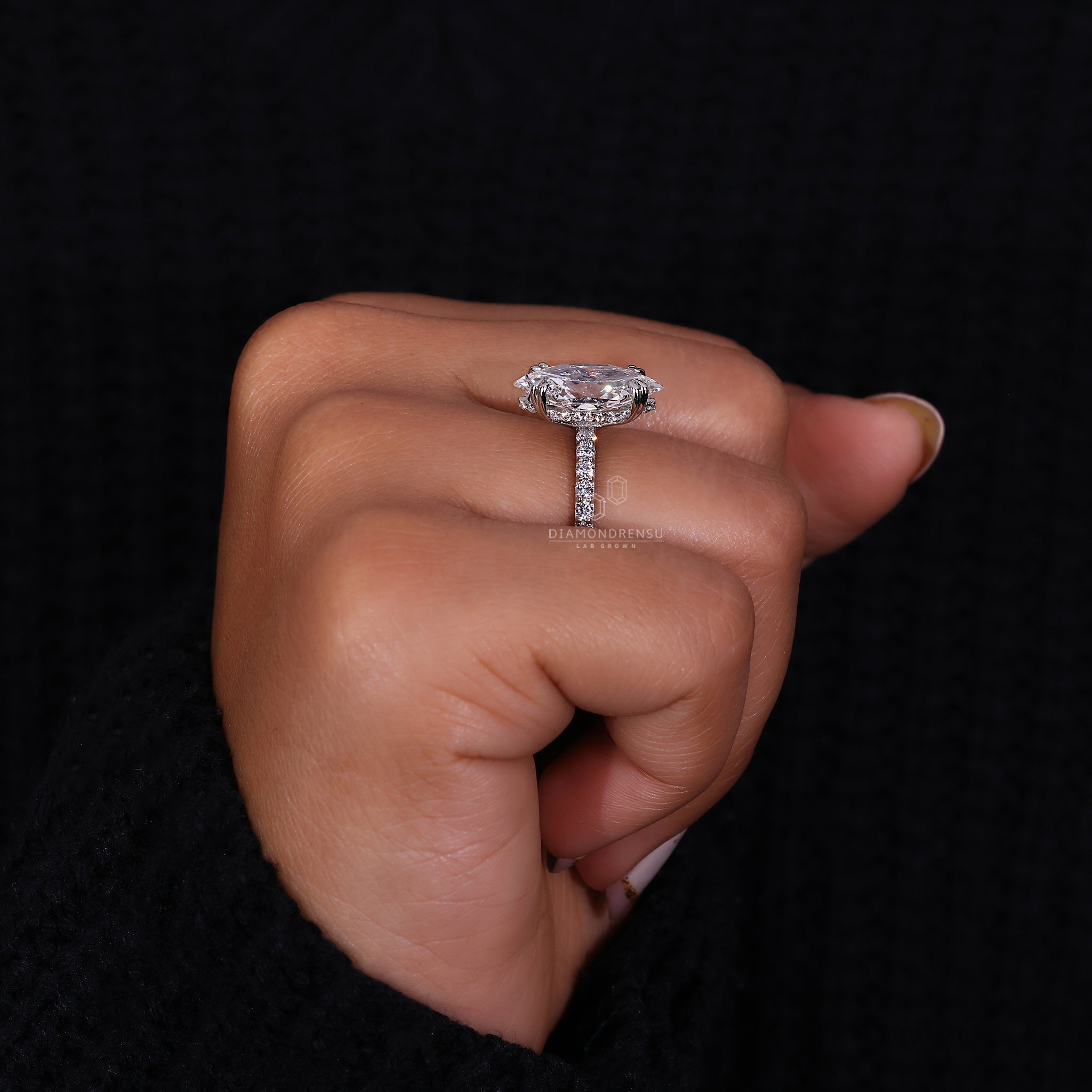 Lab grown diamond ring with a hidden halo design.
