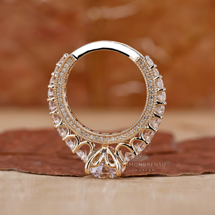 Yellow gold ring by Diamondrensu UK with pave setting.
