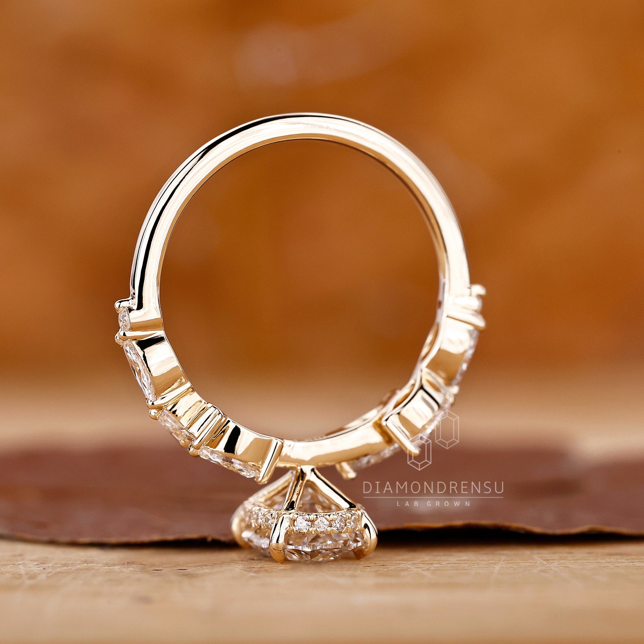 Halo Oval Ring Engagement in oval ring with side stones
