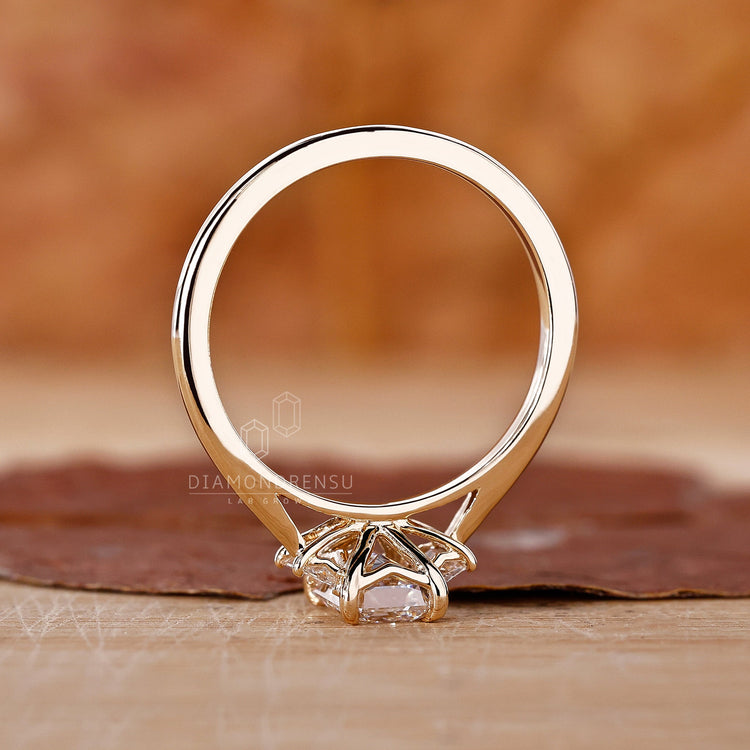 Emerald cut engagement ring showcasing timeless handmade artistry.