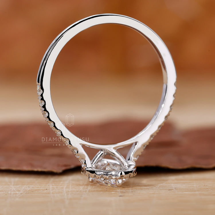 4 prong setting ring with marquise and round stones.
