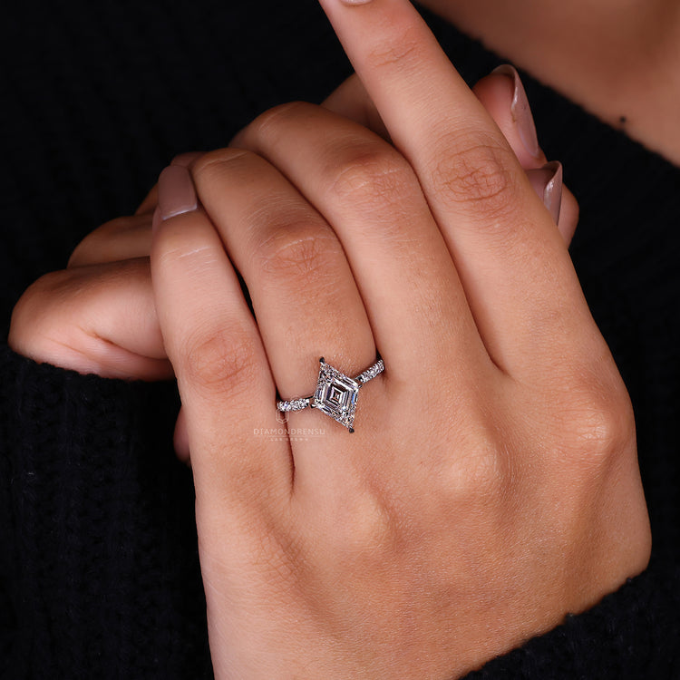 Unique white gold ring with a compass prong setting.
