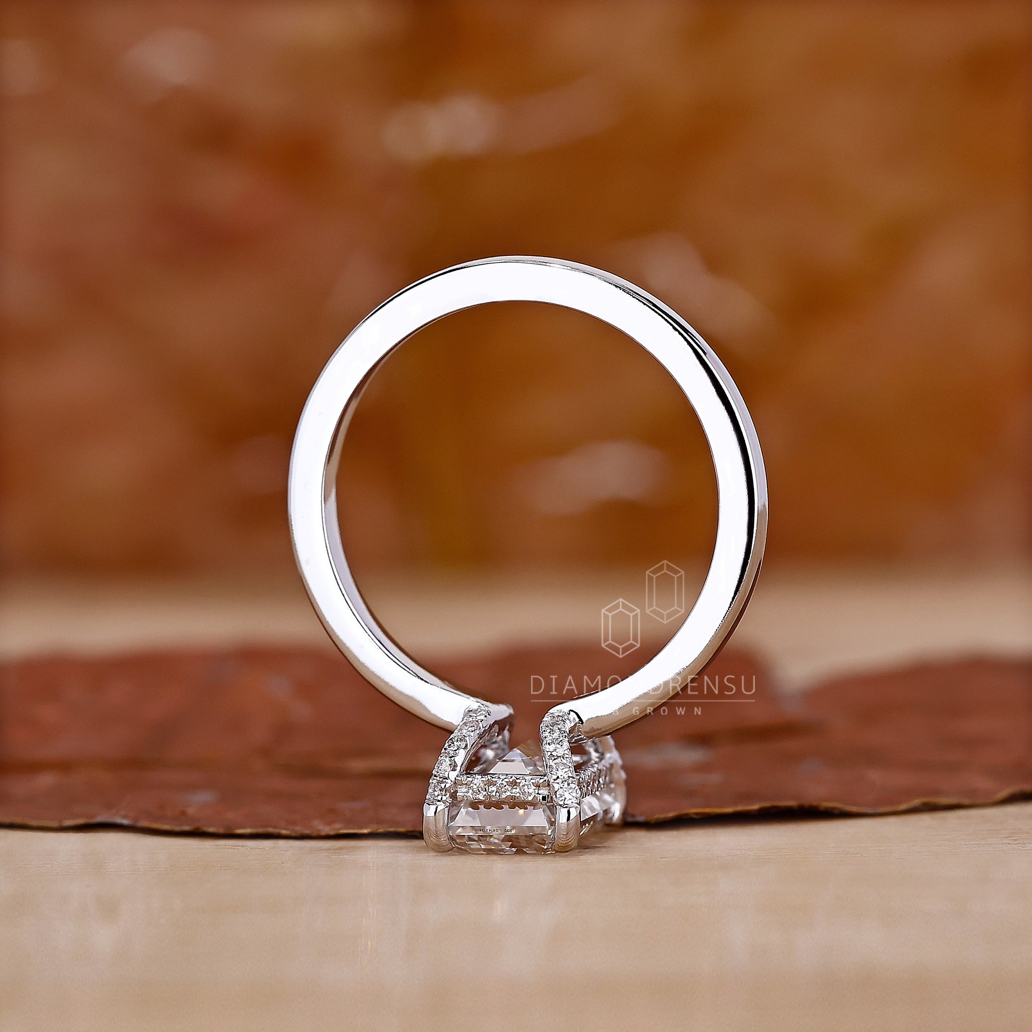Handmade jewellery showcasing an emerald cut lab diamond.
