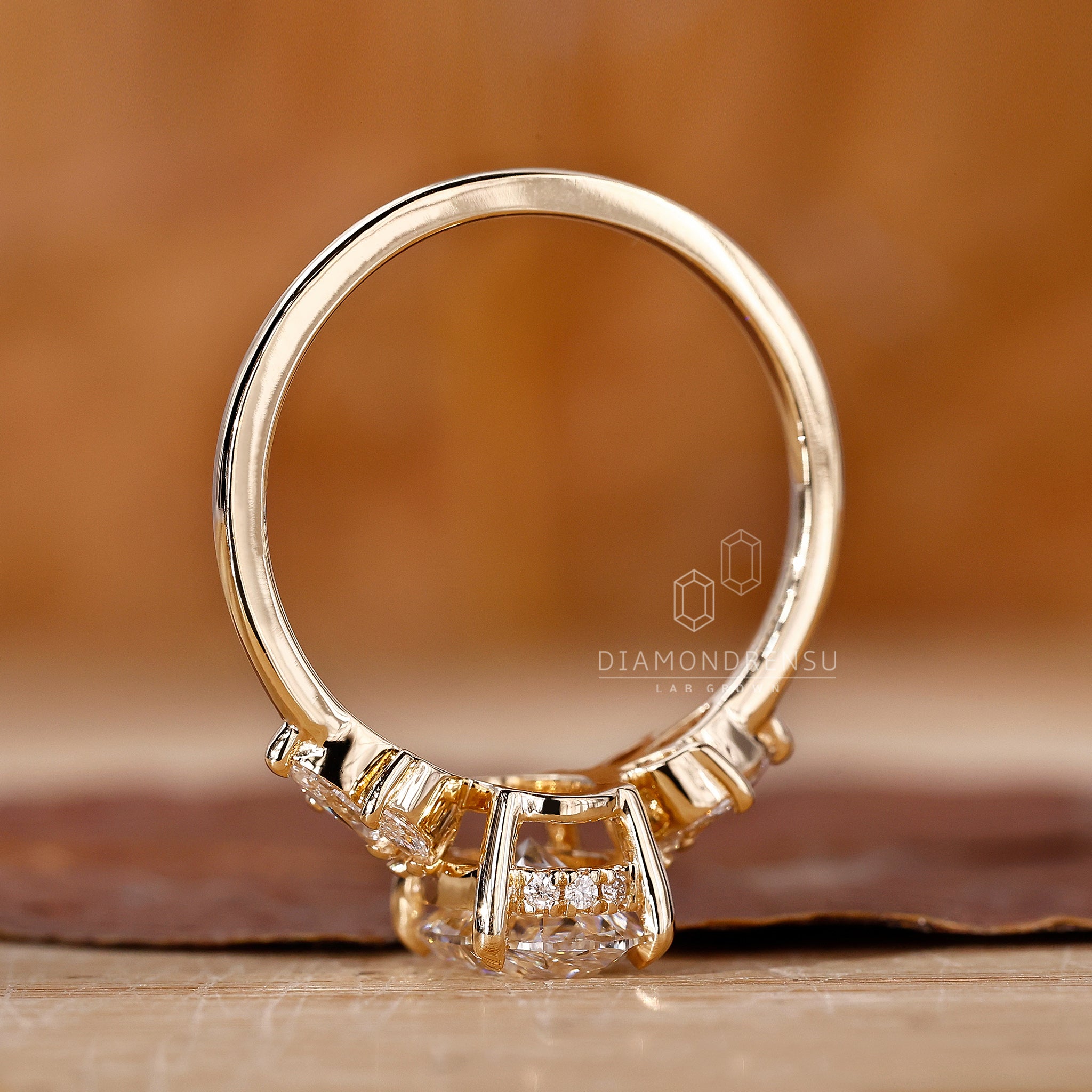 Custom UK engagement ring in a 4 prong muse style setting.
