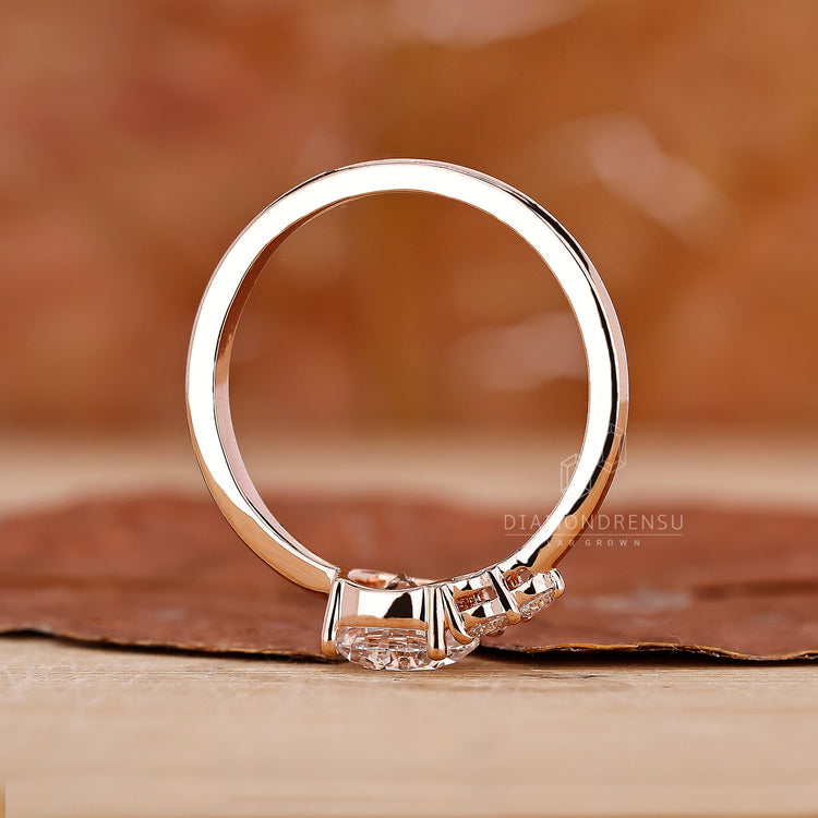 Handmade ring showcasing an asymmetrical engagement design.
