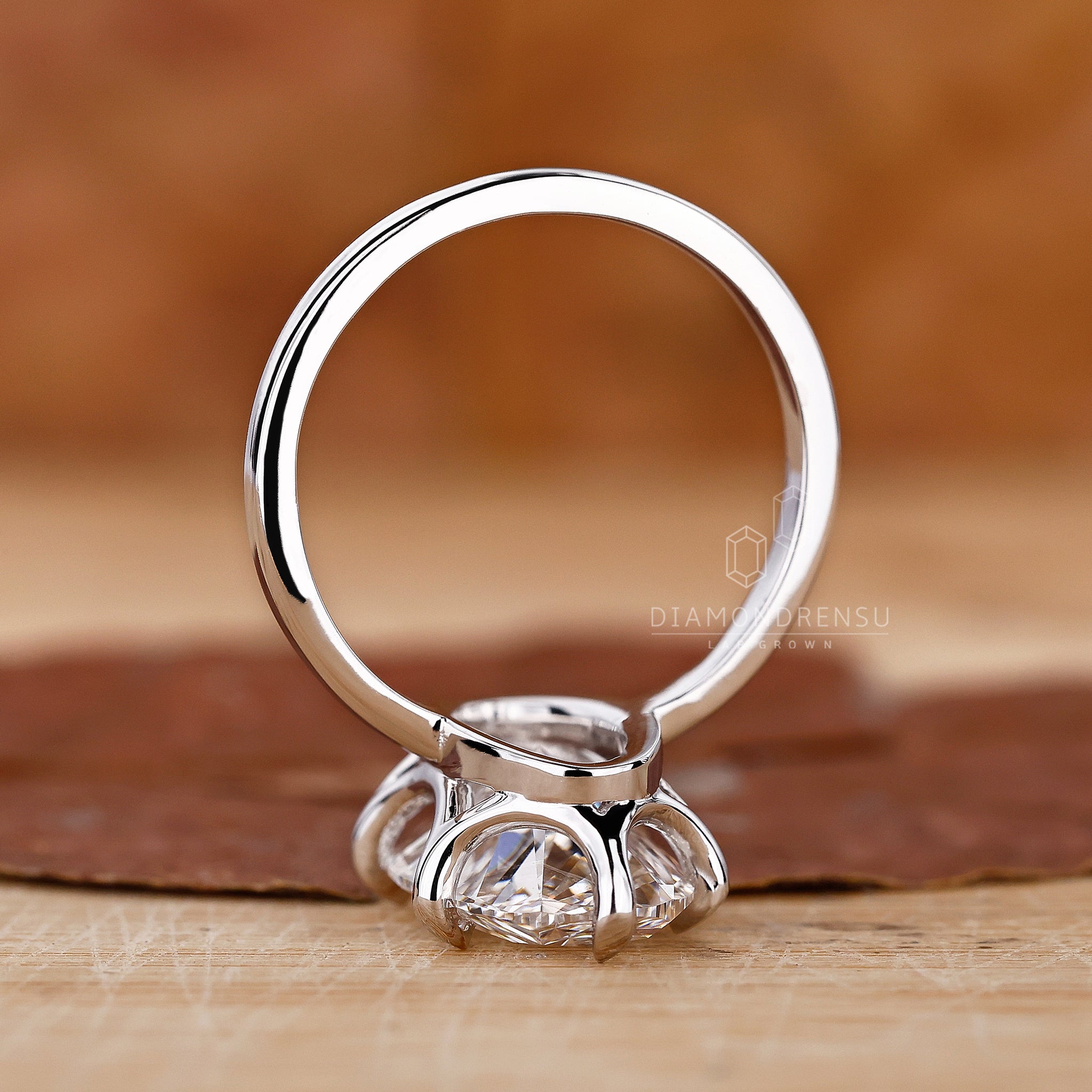 Moval Engagement Ring with handmade ring design
