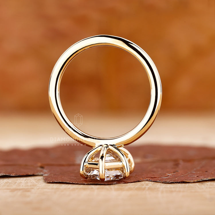 Solitaire engagement ring from Diamondrensu UK in yellow gold.
