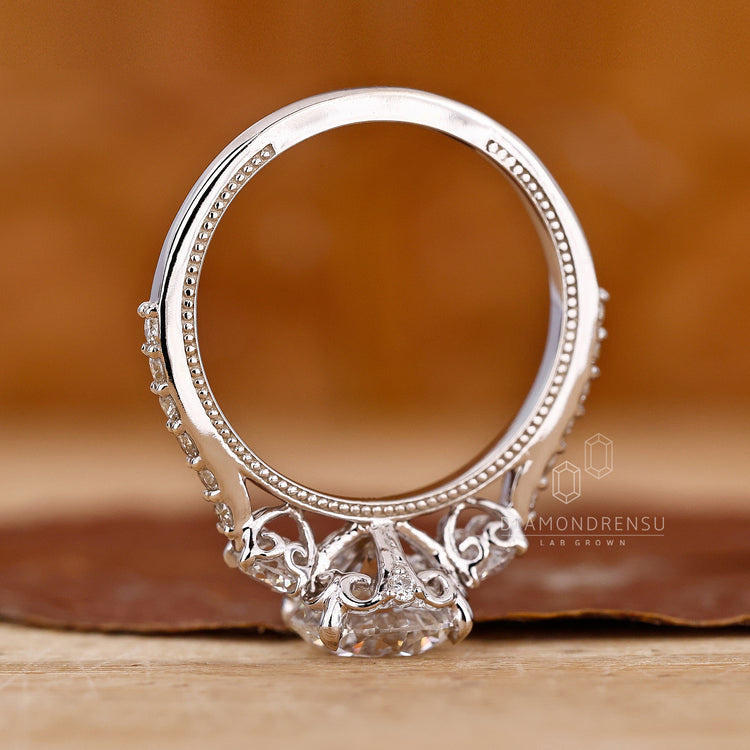Pave setting ring with round cut engagement ring
