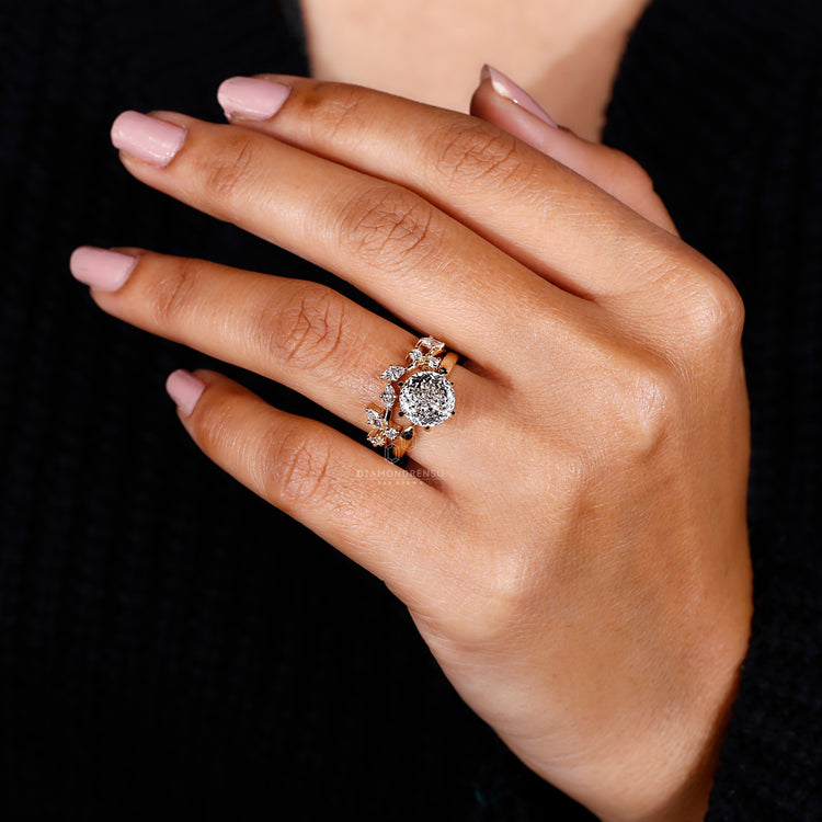 Custom bridal set in yellow gold with Portuguese cut diamond centre.
