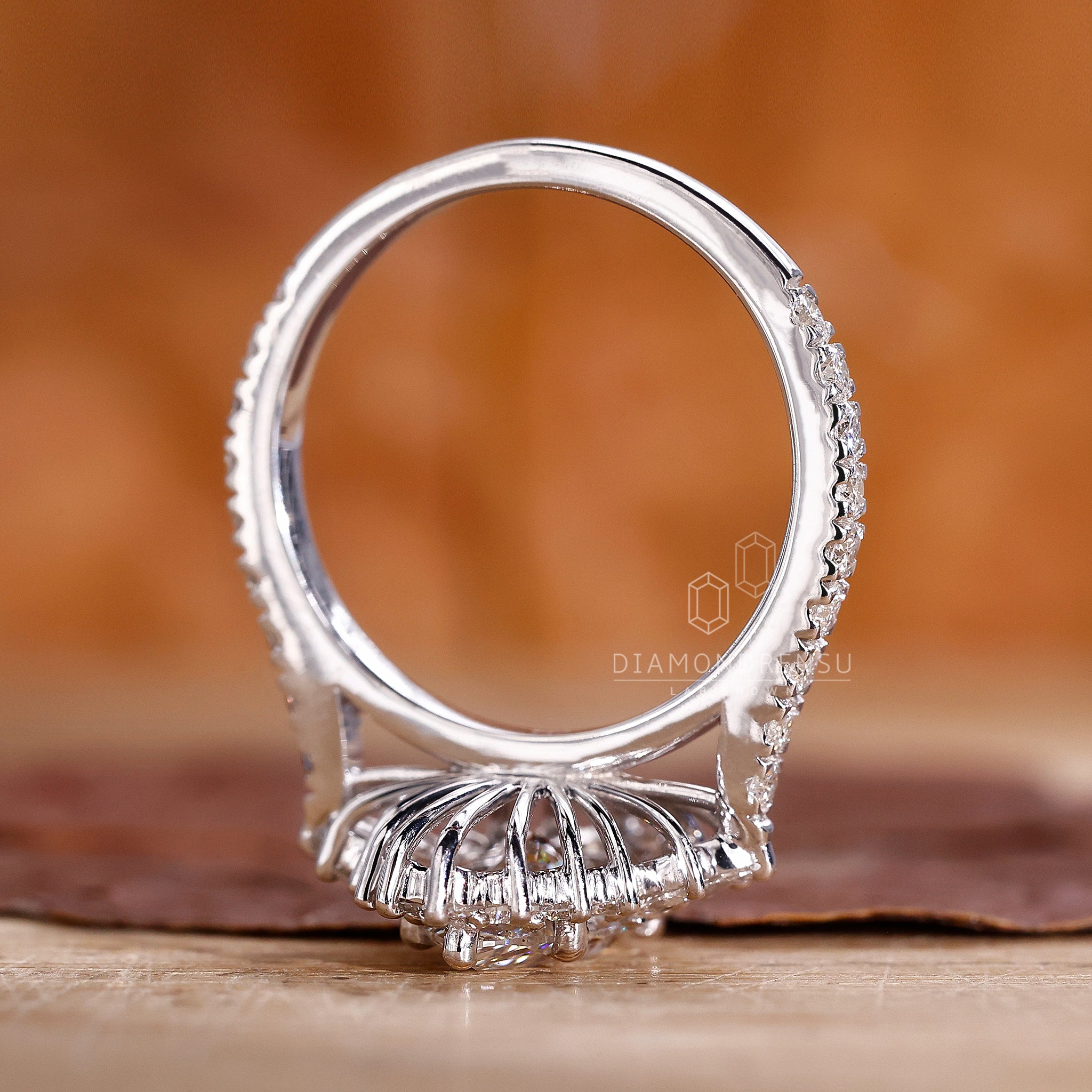 Pave setting ring with custom design from Diamondrensu UK.
