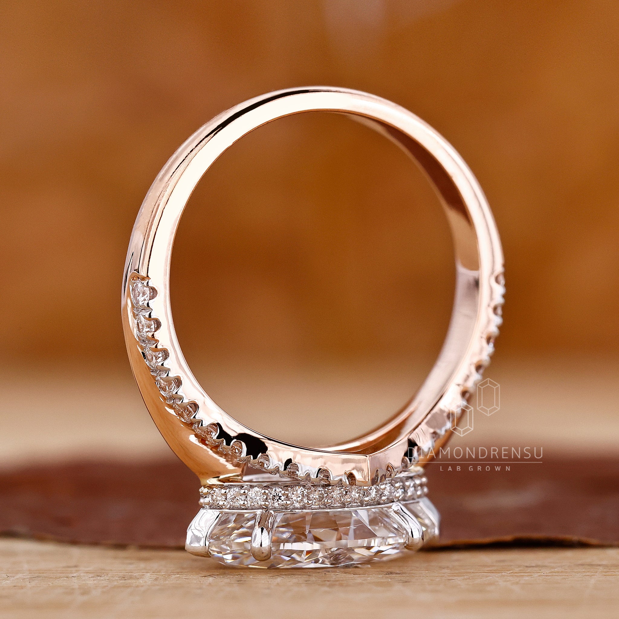East west engagement ring in white and rose gold from Diamondrensu UK.
