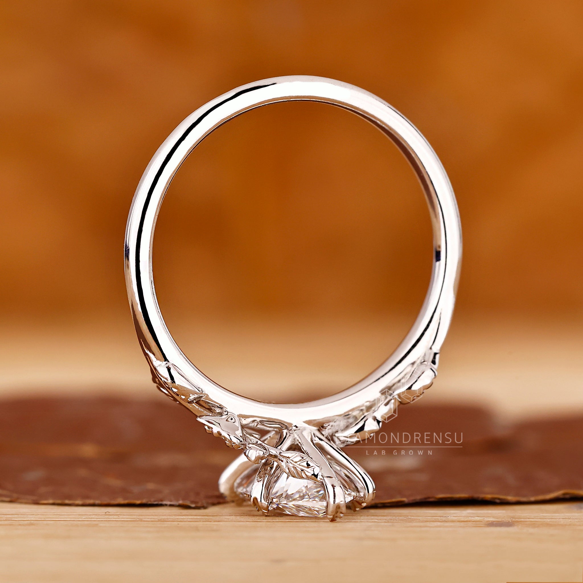 Buy engagement ring with marquise and round diamonds.
