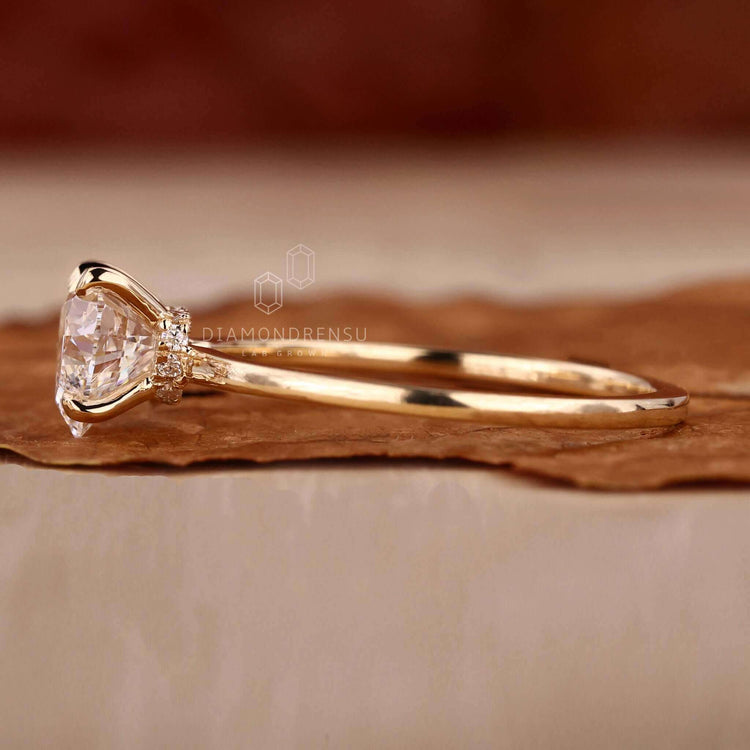 Heart shape ring diamond crafted with a 4 prong claw setting and yellow gold band for a classic look.
