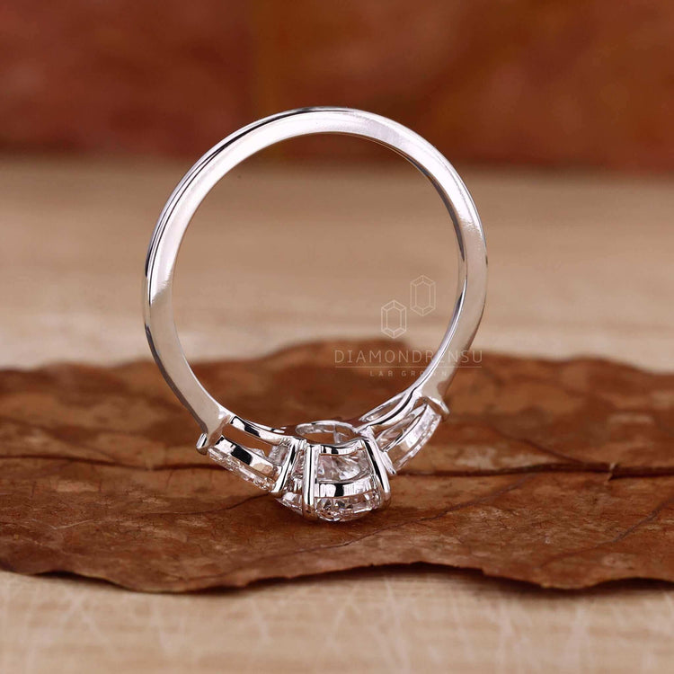 Oval shaped diamond ring with handmade jewellery details, blending sophistication and beauty for UK engagement traditions.