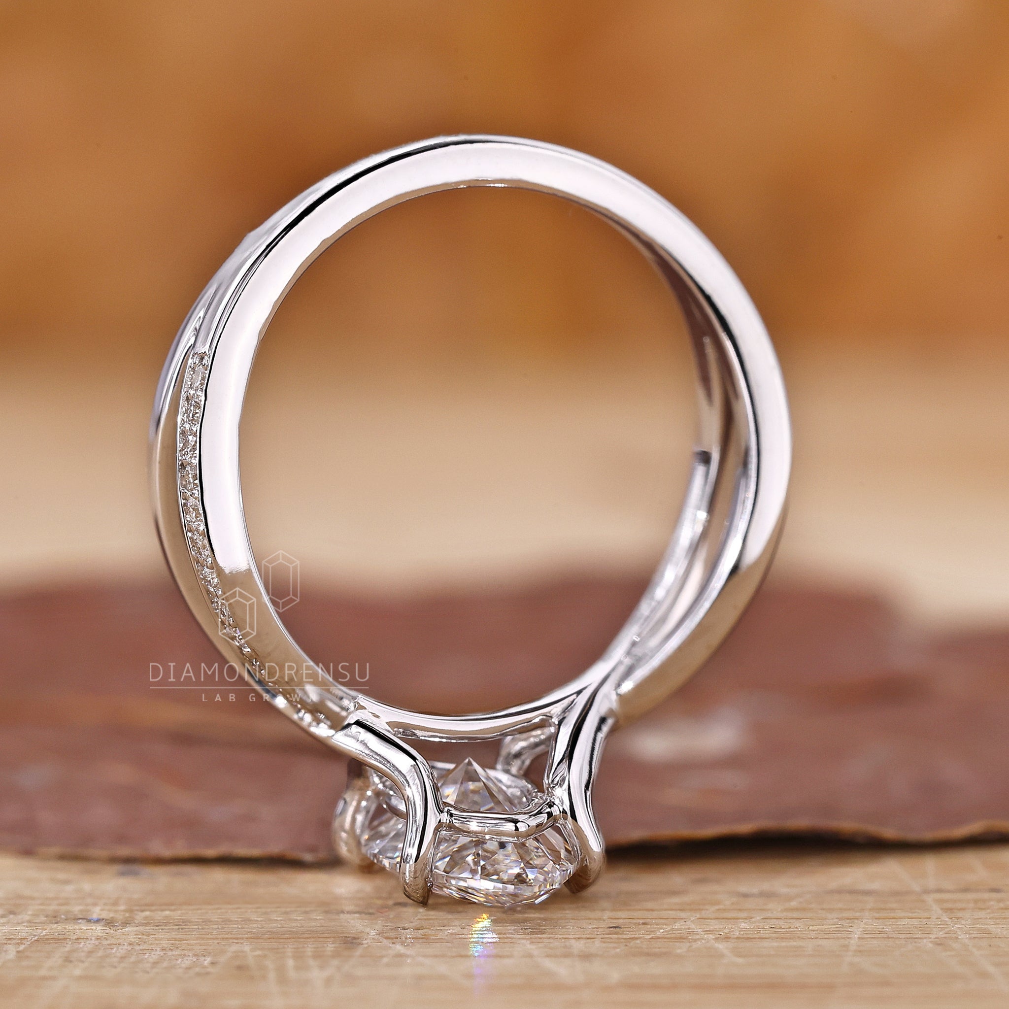 Buy engagement ring with white gold setting and lab grown diamonds.
