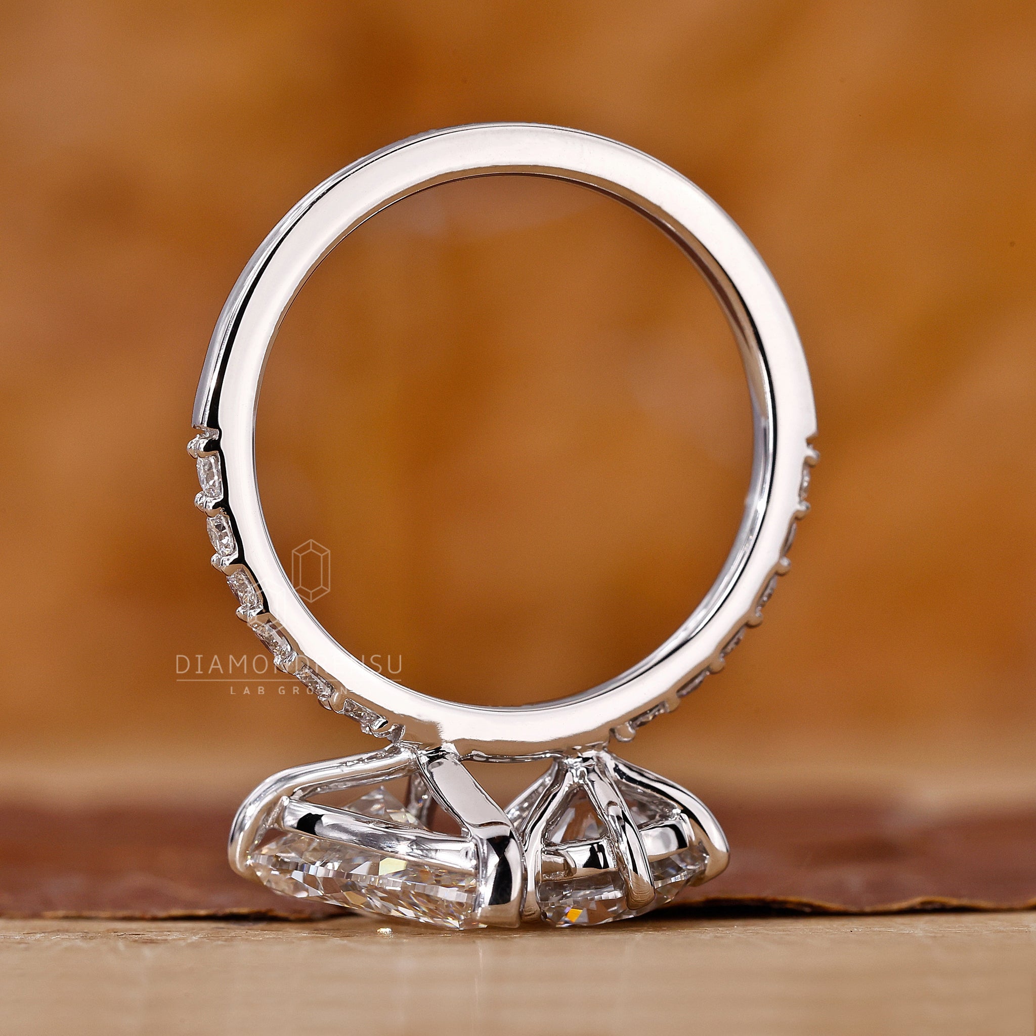 IGI certified lab grown diamond ring with elegant pave setting.
