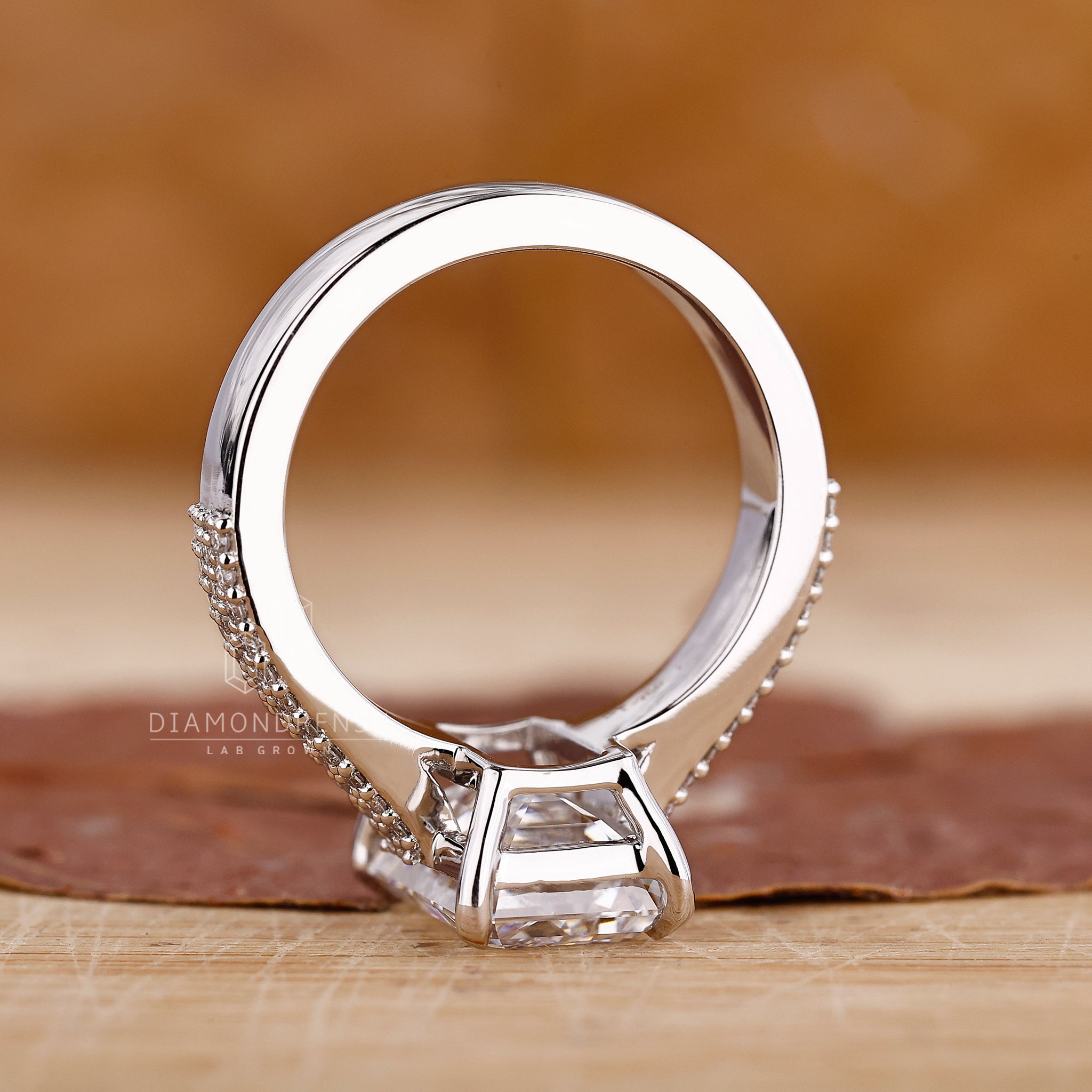 Lab grown diamond ring with dual shank and white and rose gold design.
