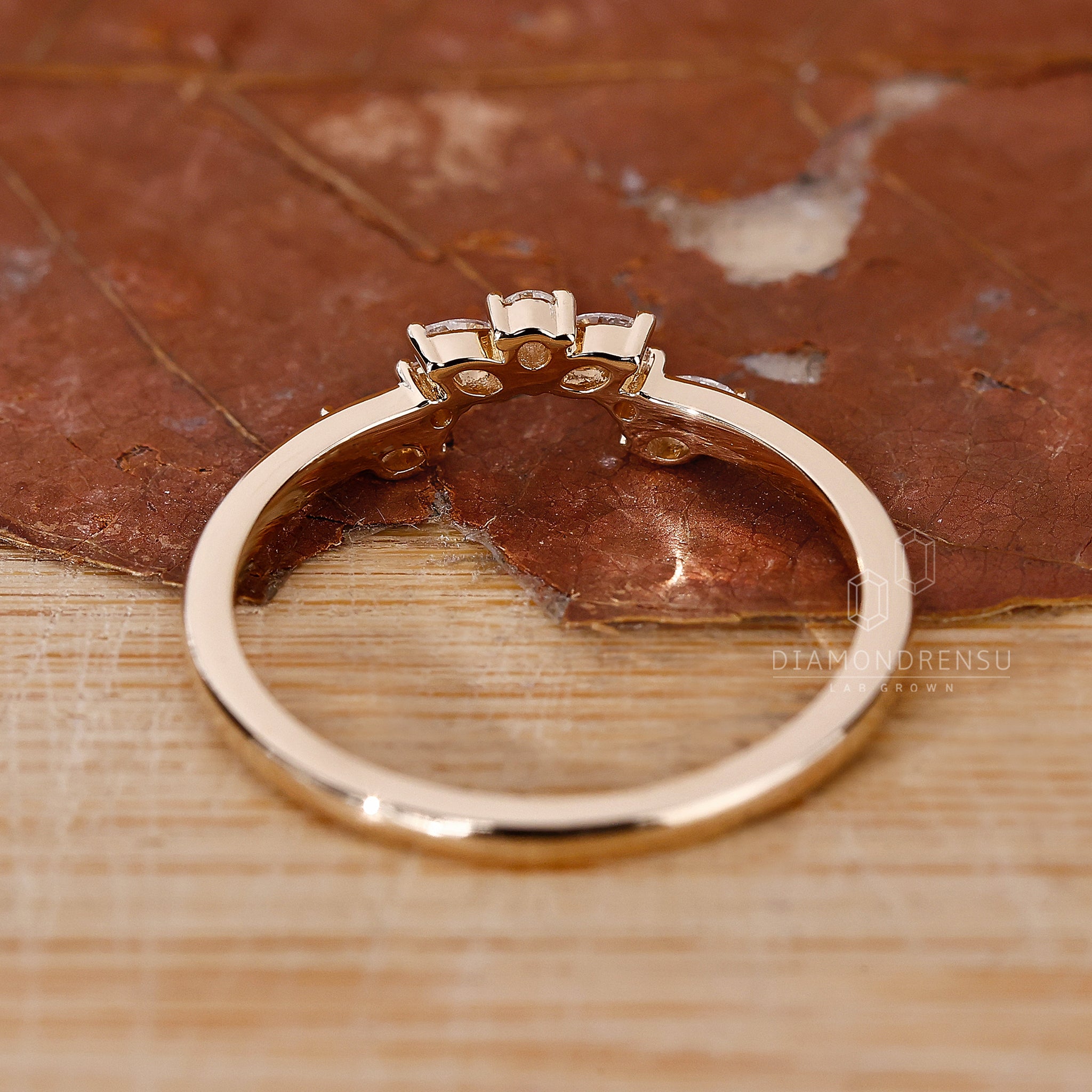 Diamondrensu UK U shaped wedding band.
