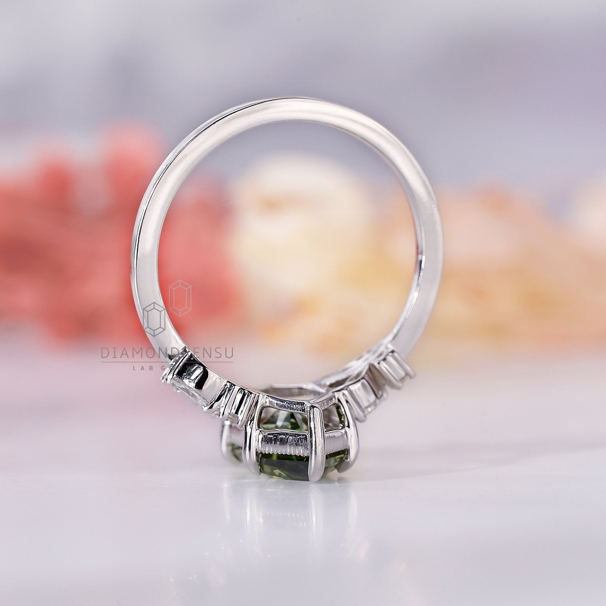 Nature inspired ring featuring a stunning marquise diamond.