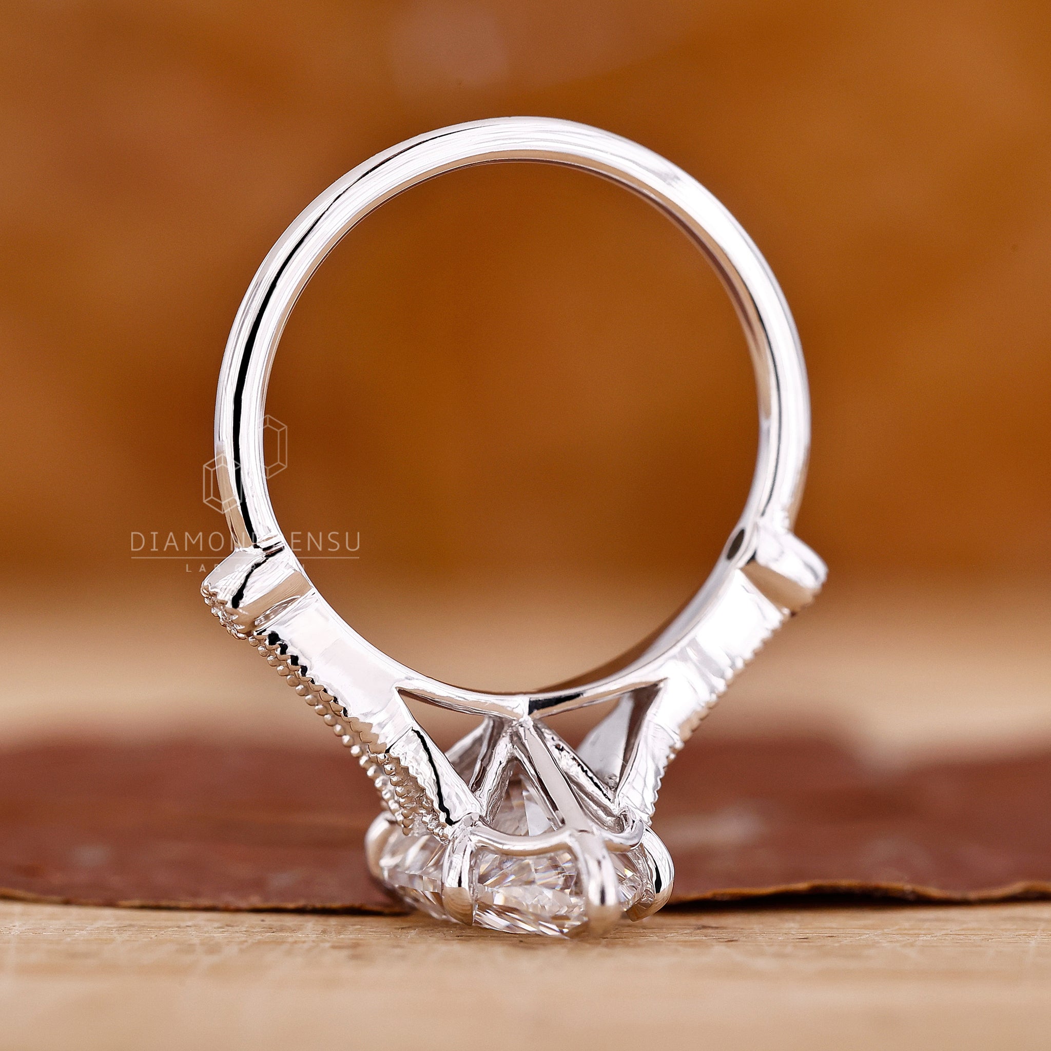 Diamondrensu UK engagement ring with lab diamond and perong setting.
