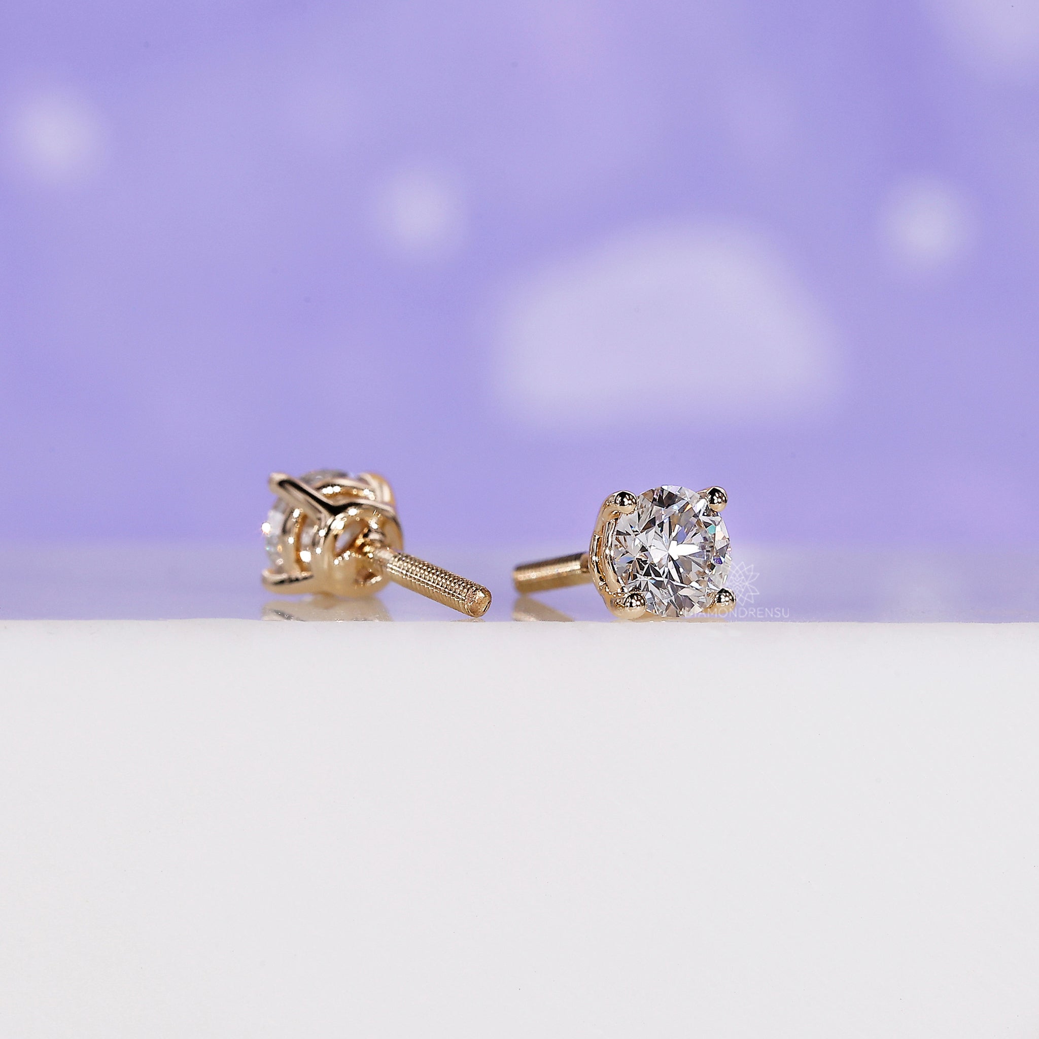 Elegant yellow gold handmade earrings set with lab grown diamonds.