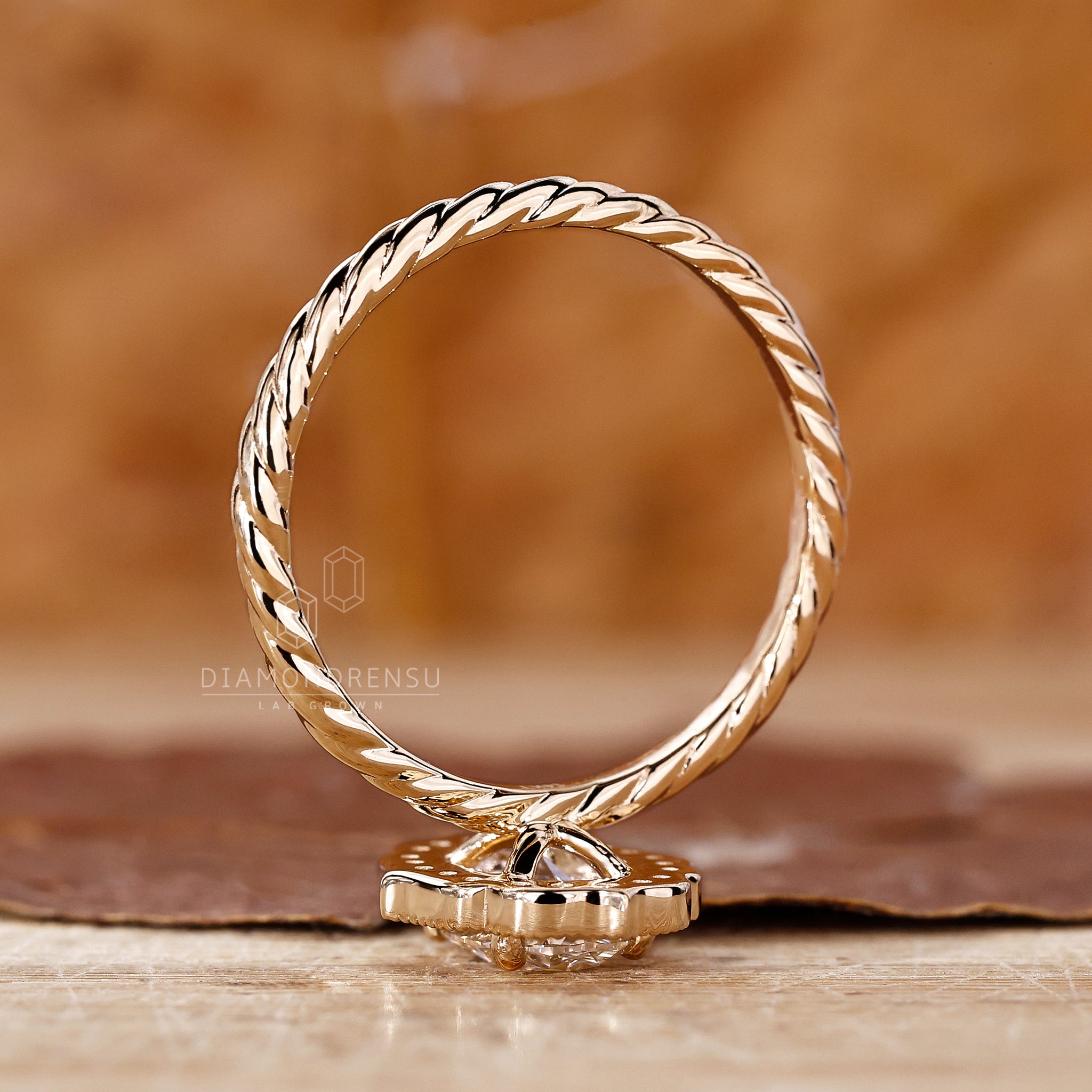 Engage Ring UK offers twisted rope setting with oval diamond design.
