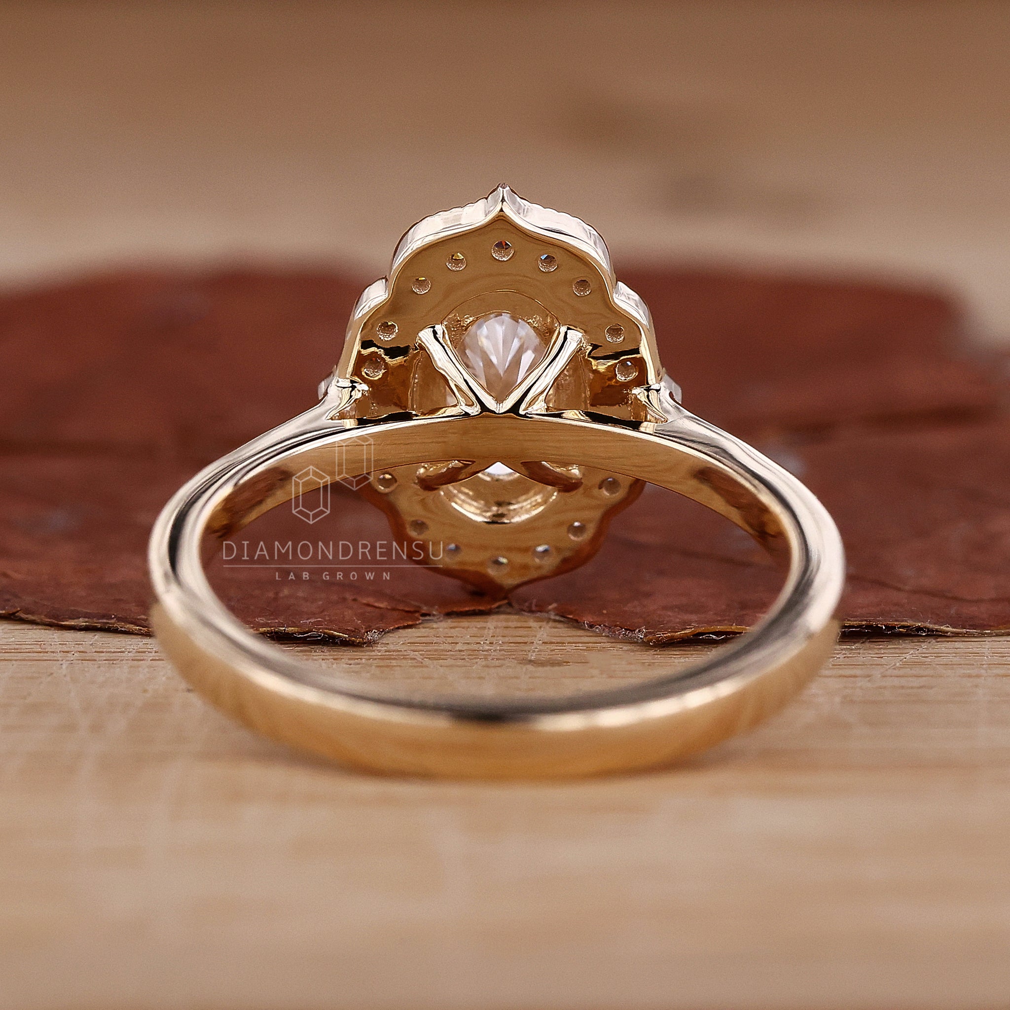 Antique vintage engagement ring with detailed filigree and an old European cut diamond