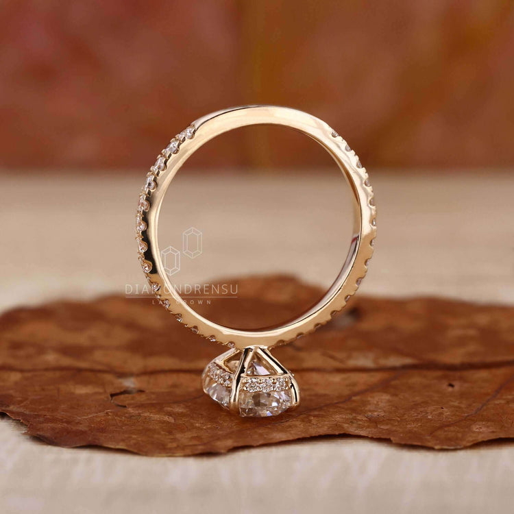 Pave set ring paired with a claw prong ring for an elegant finish.
