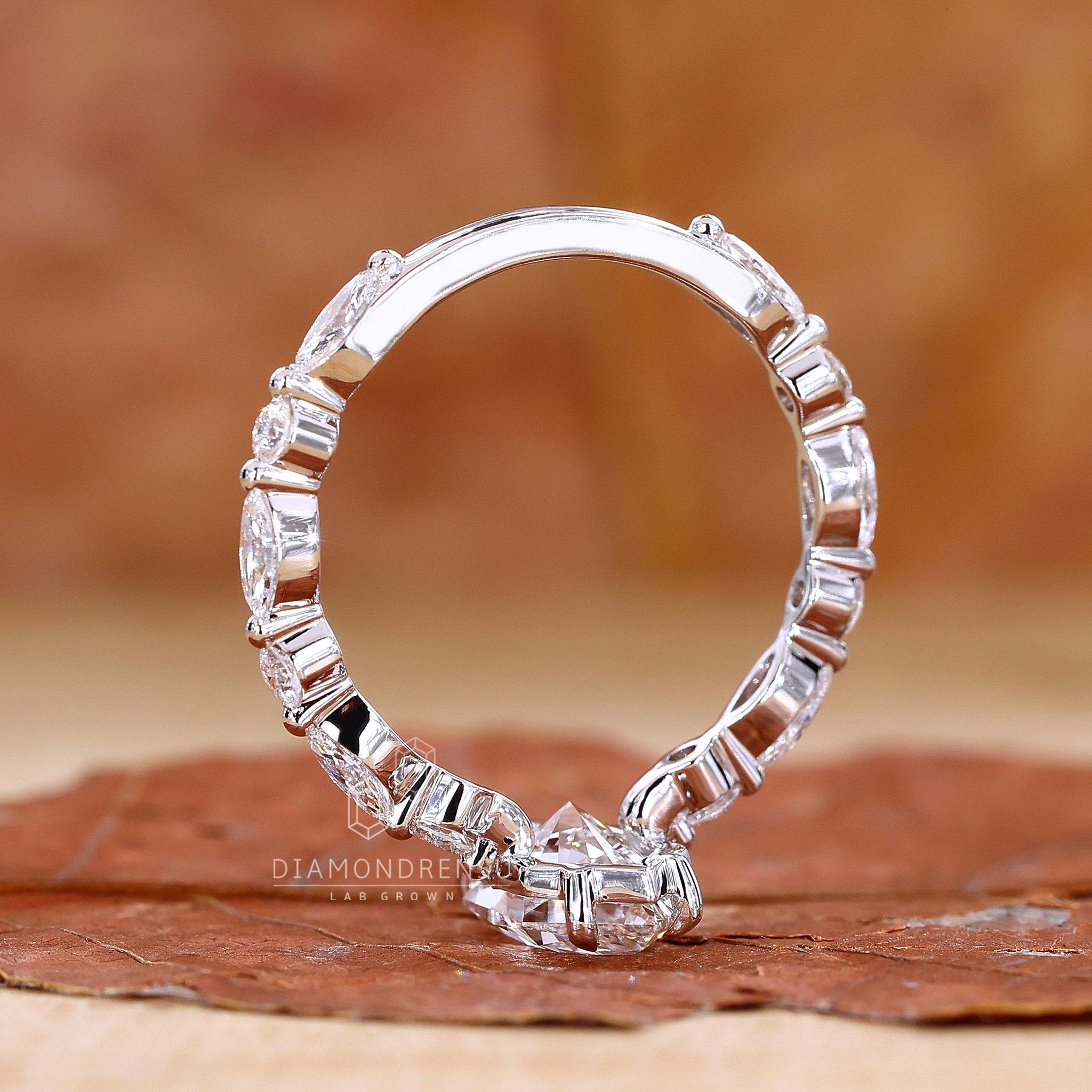 Lab Grown Diamond Dutch marquise ring with round side stones.
