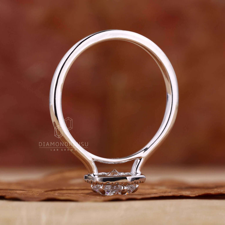 Exquisite cathedral setting halo engagement ring made to impress.