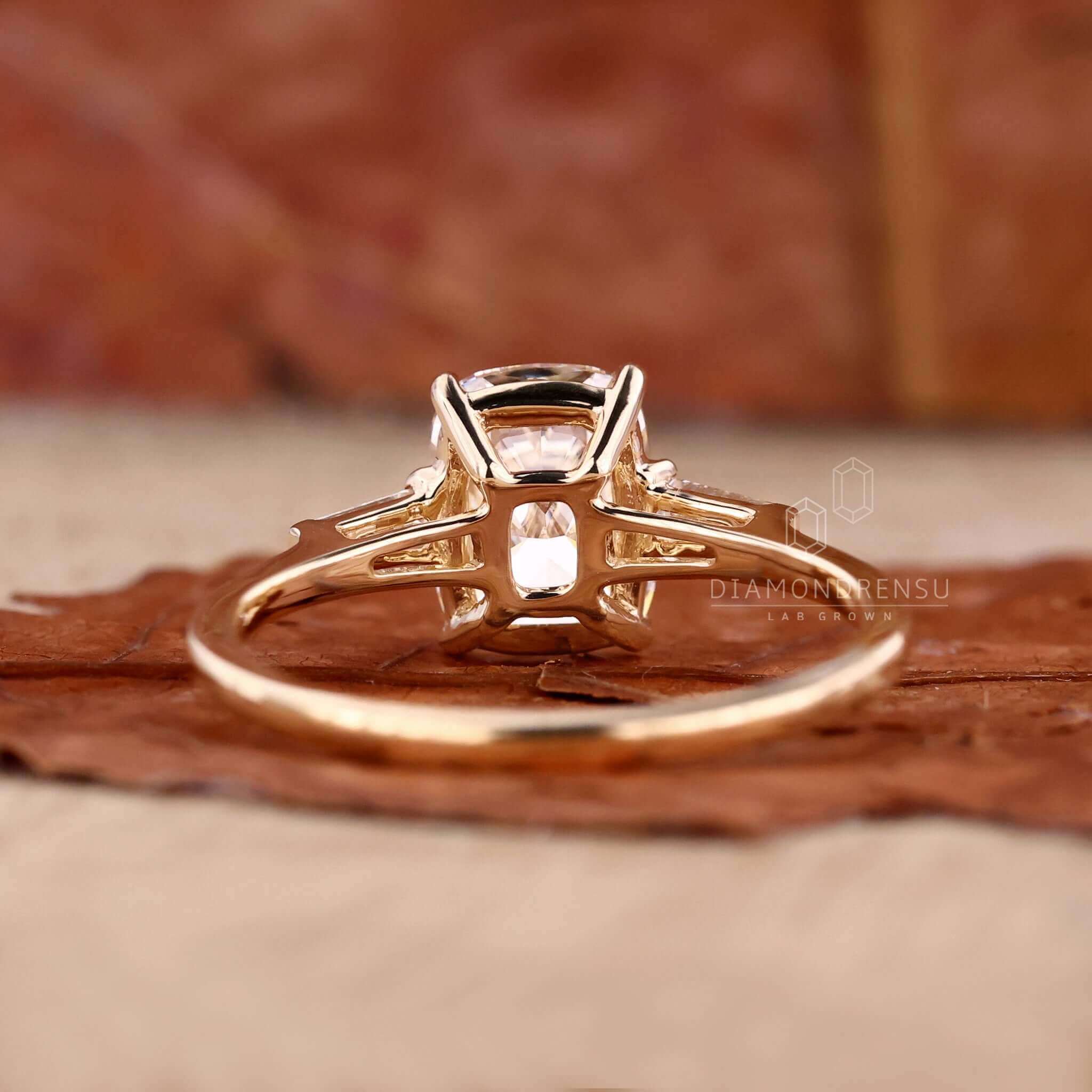 Luxurious three stone gold ring crafted with exceptional artistry.