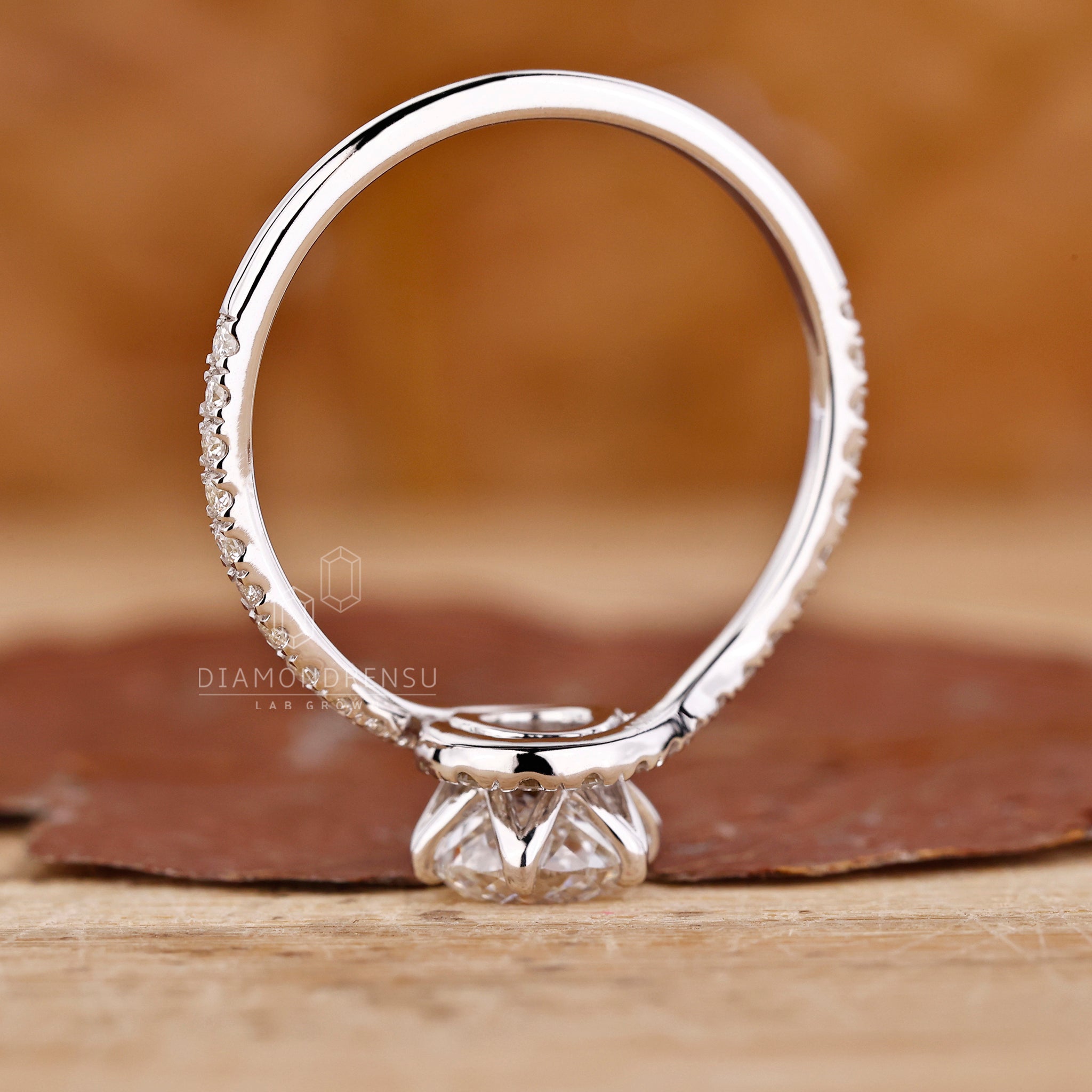 Lab Grown Diamond is used for center and side stones.
