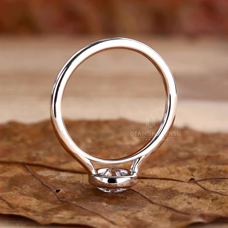 Stunning bezel set diamond ring perfect for special occasions.