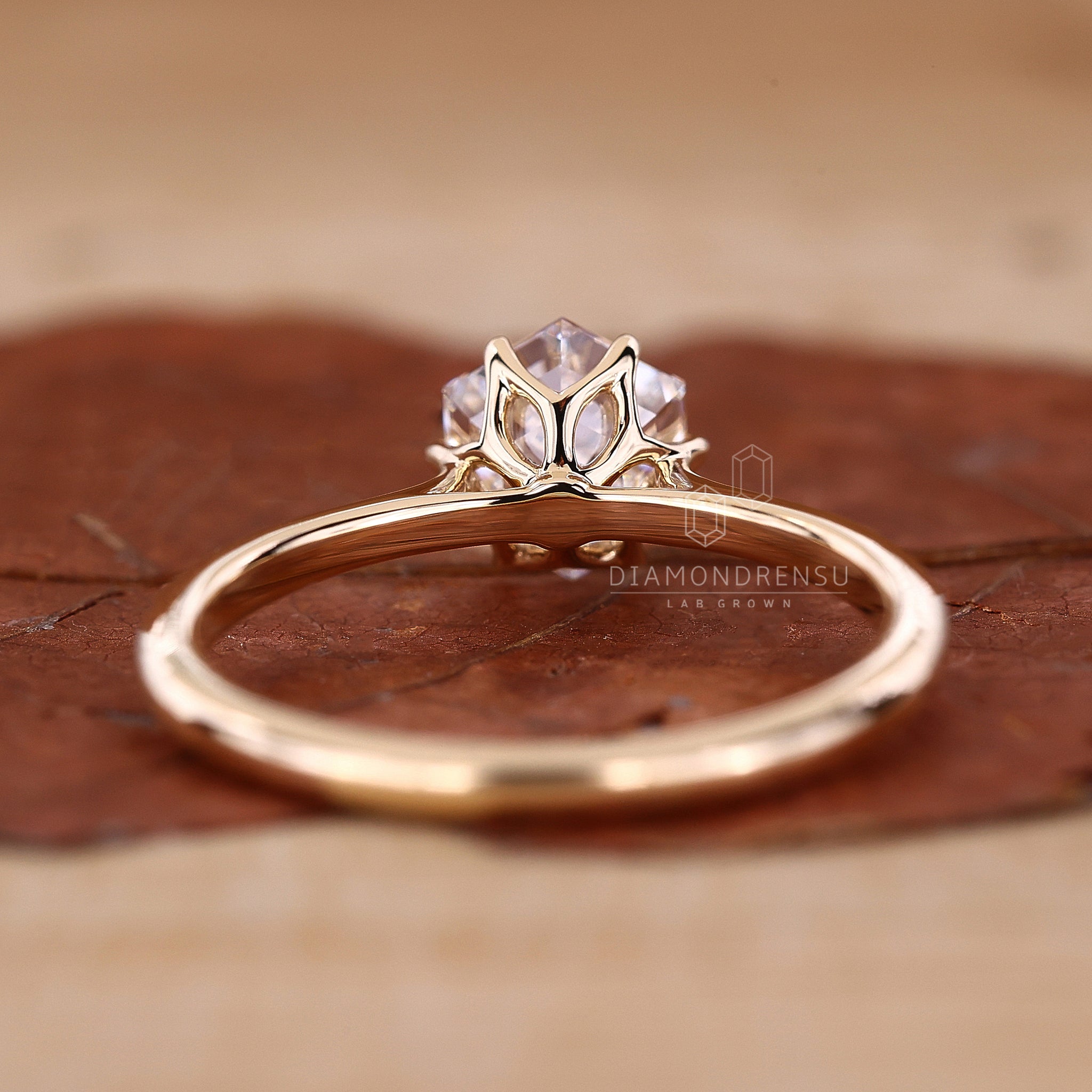 Diamondrensu Uk engagement ring with a 6 claw prong setting.
