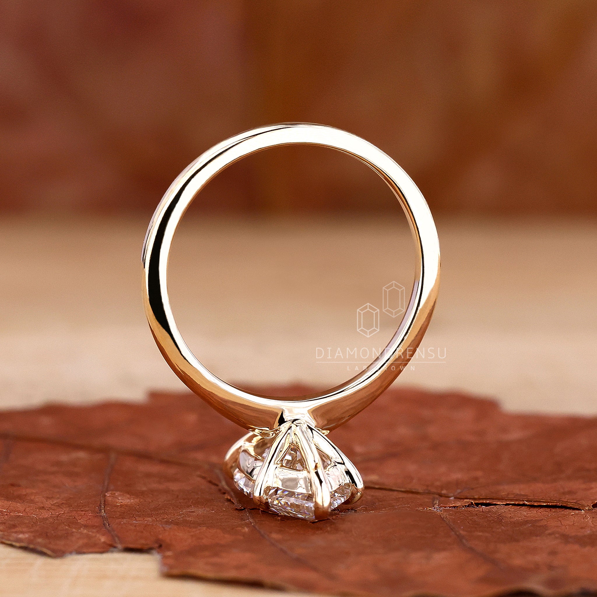 Yellow gold engagement ring with solitaire.
