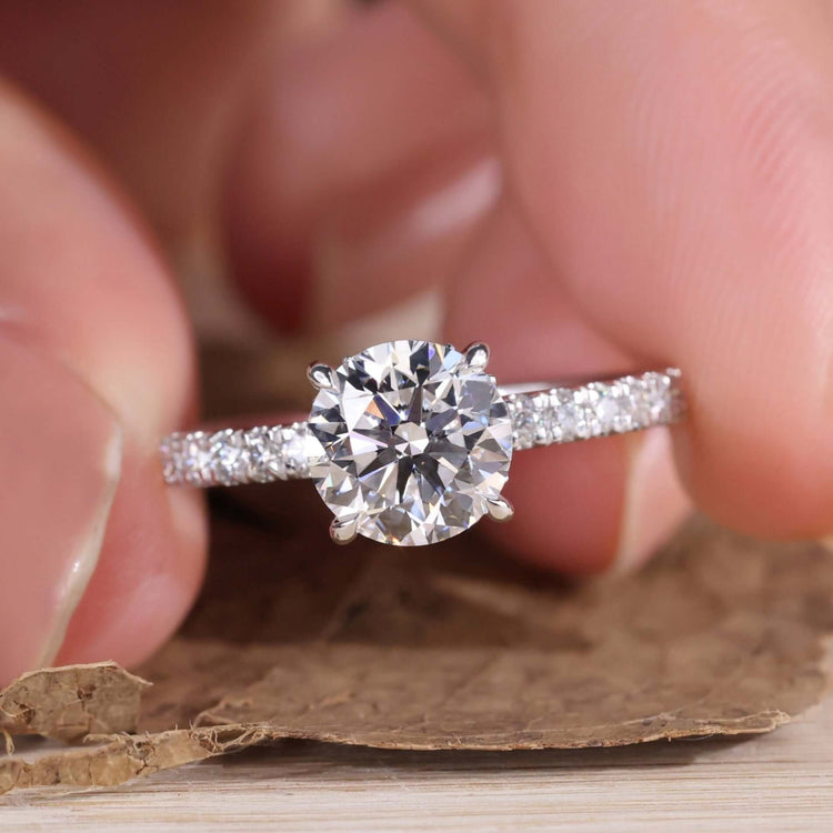 Hidden Halo Engagement Ring with pave setting for timeless elegance.