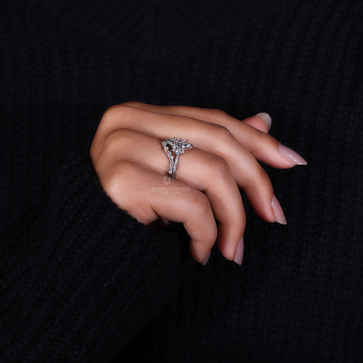 Claw prong ring with marquise diamond ring and tiara diamond band.
