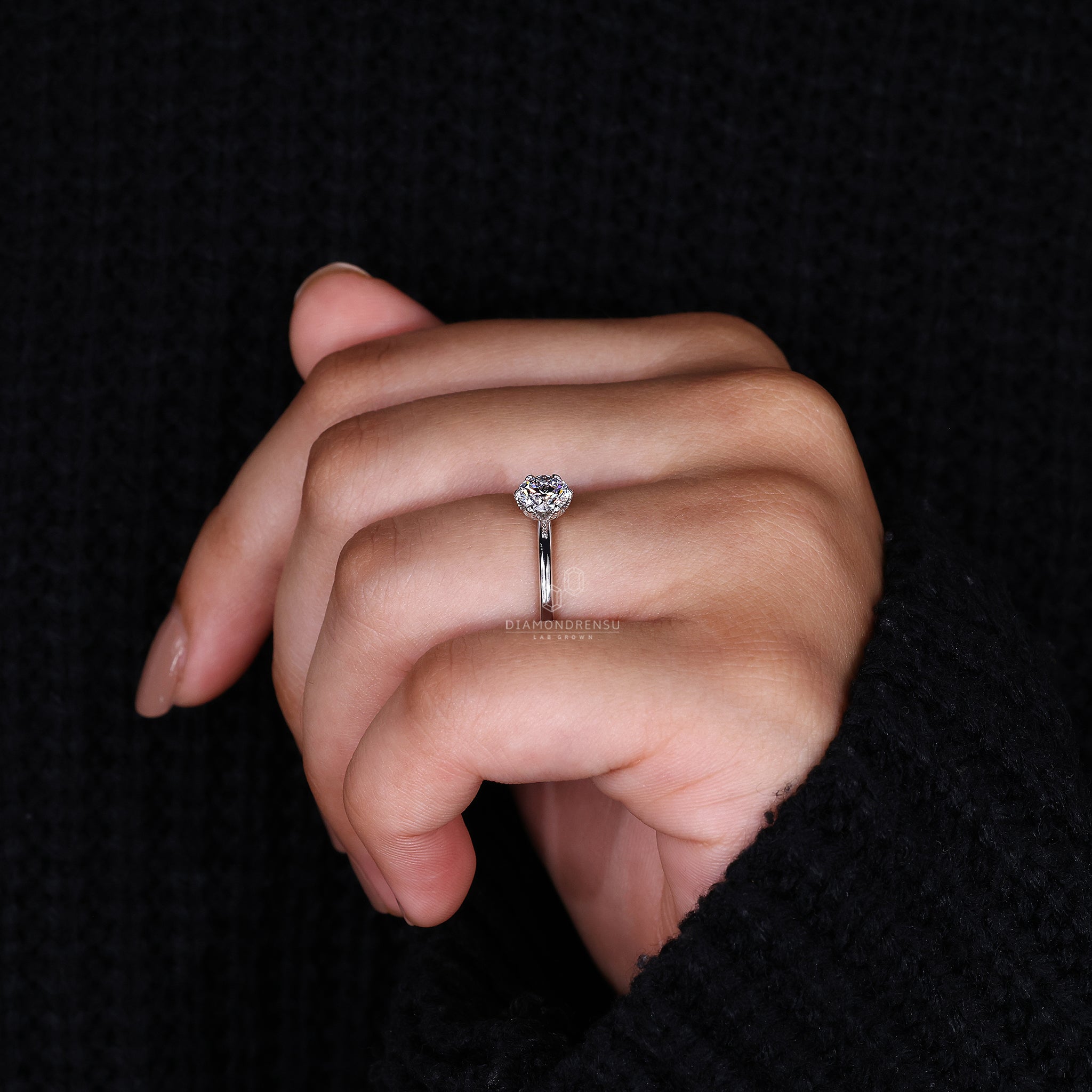 Simple engagement ring set in white gold engagement ring.
