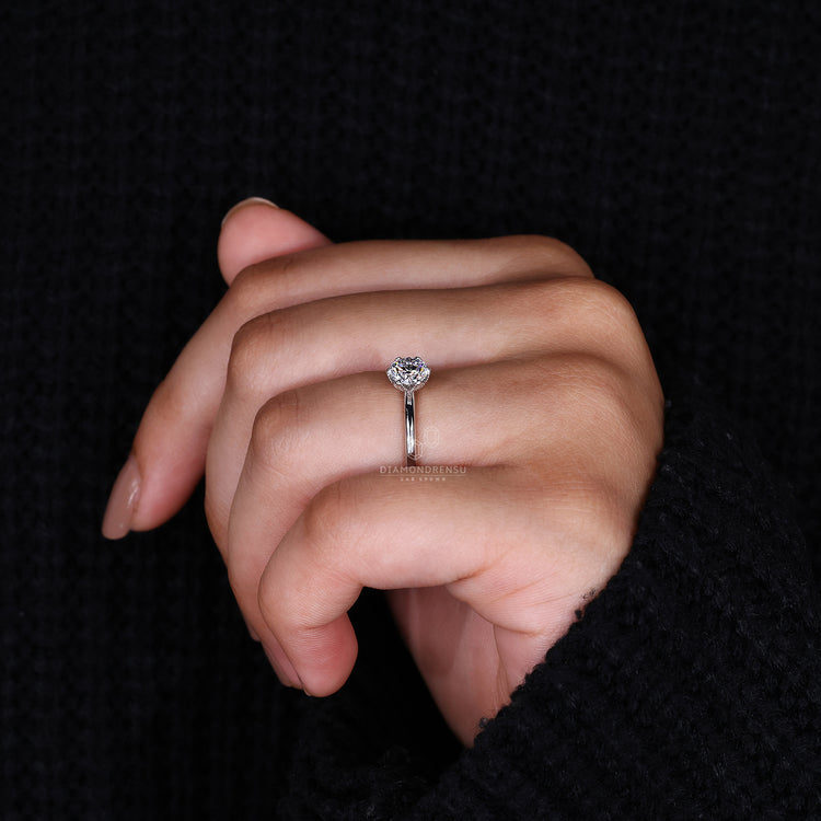 Simple engagement ring set in white gold engagement ring.

