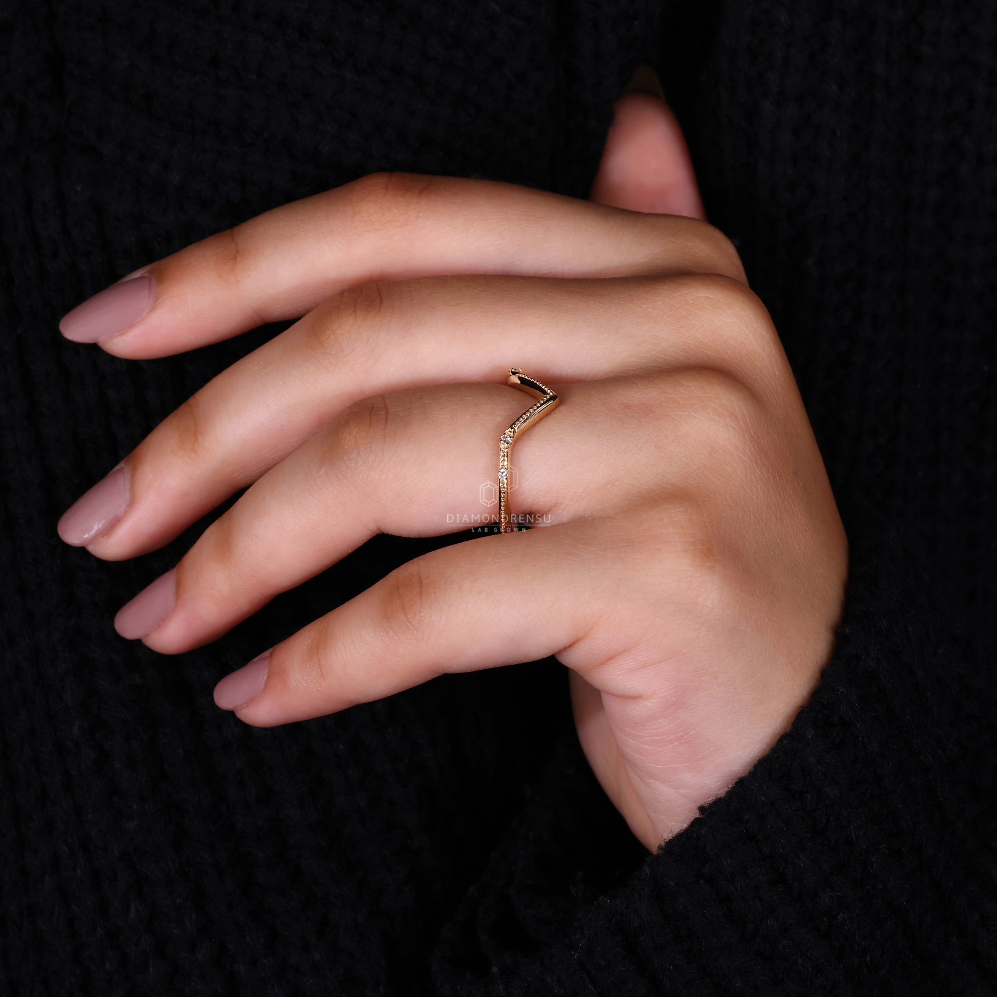 Yellow gold lab diamond V-shaped wedding ring.
