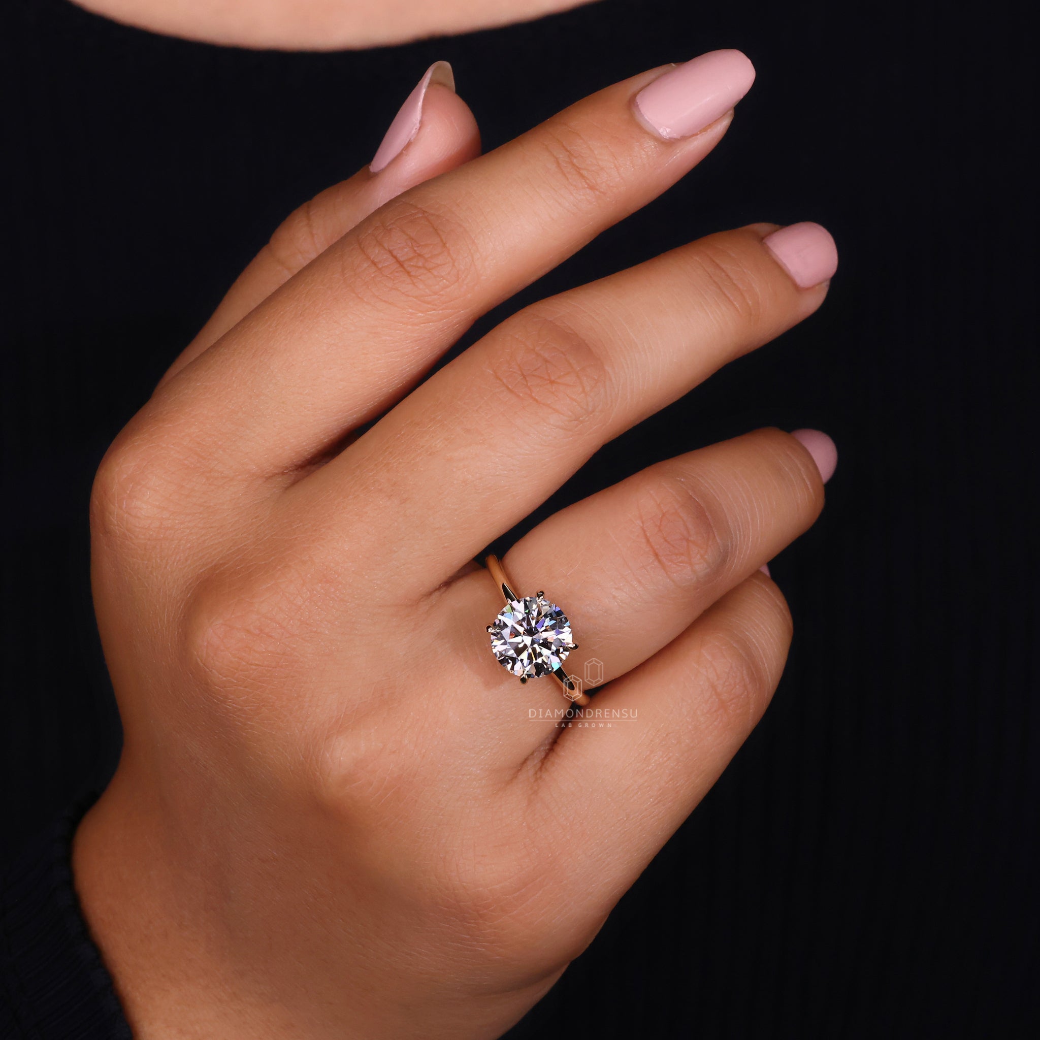 Lab grown diamond solitaire ring in yellow gold.
