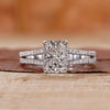 Radiant cut engagement ring with a hidden halo design.
