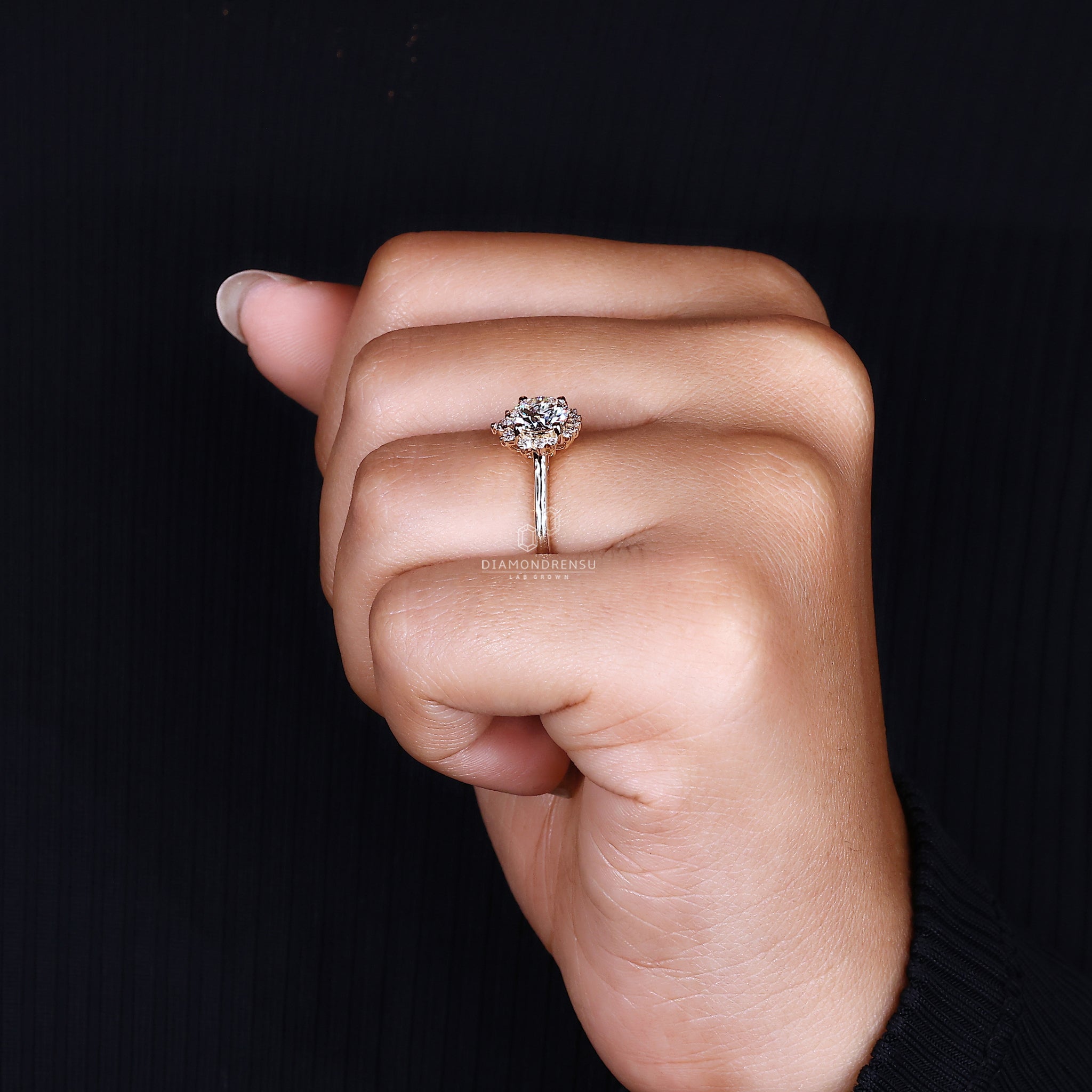 Unique engagement ring styled with cathedral setting ring.
