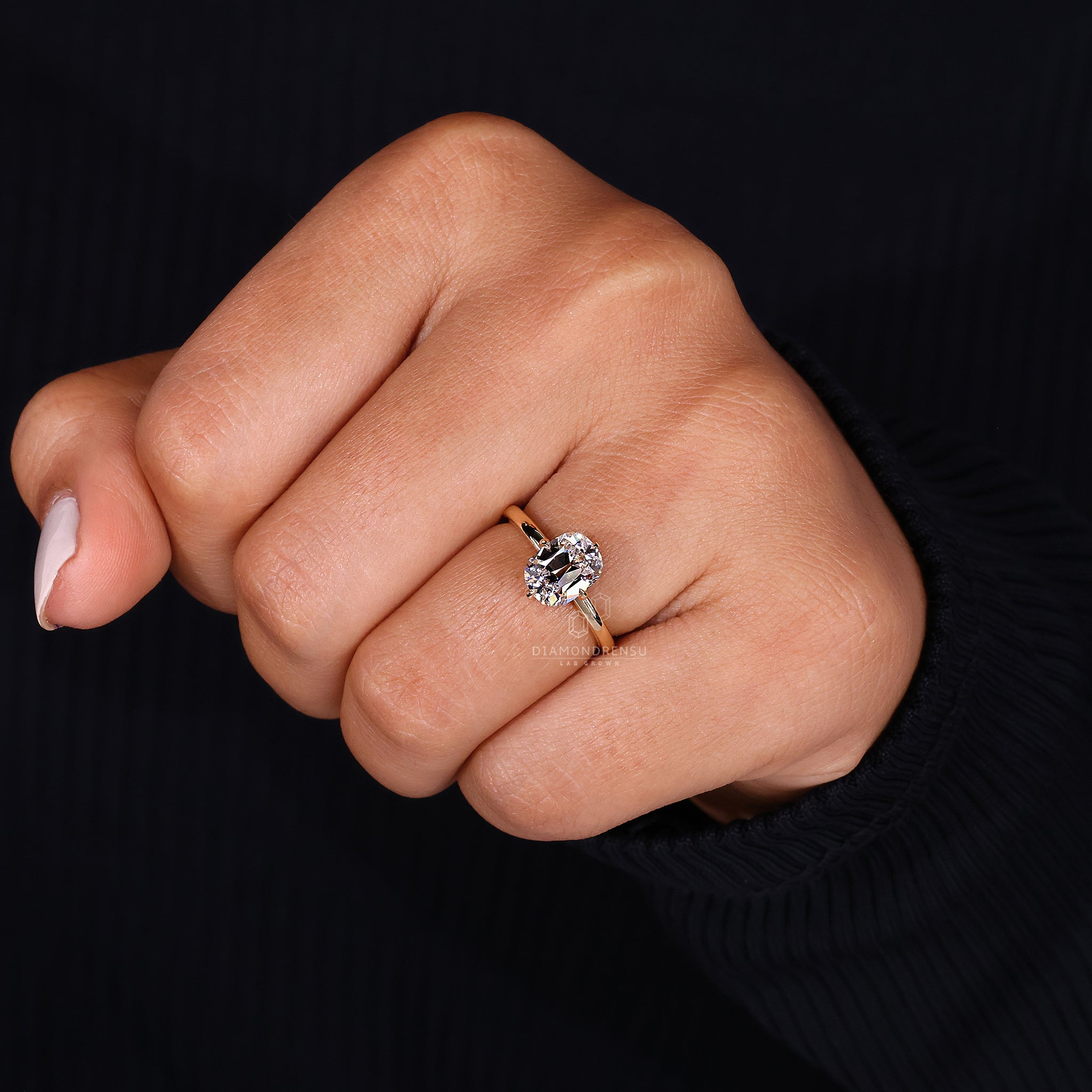 Yellow gold ring in custom engagement ring style
