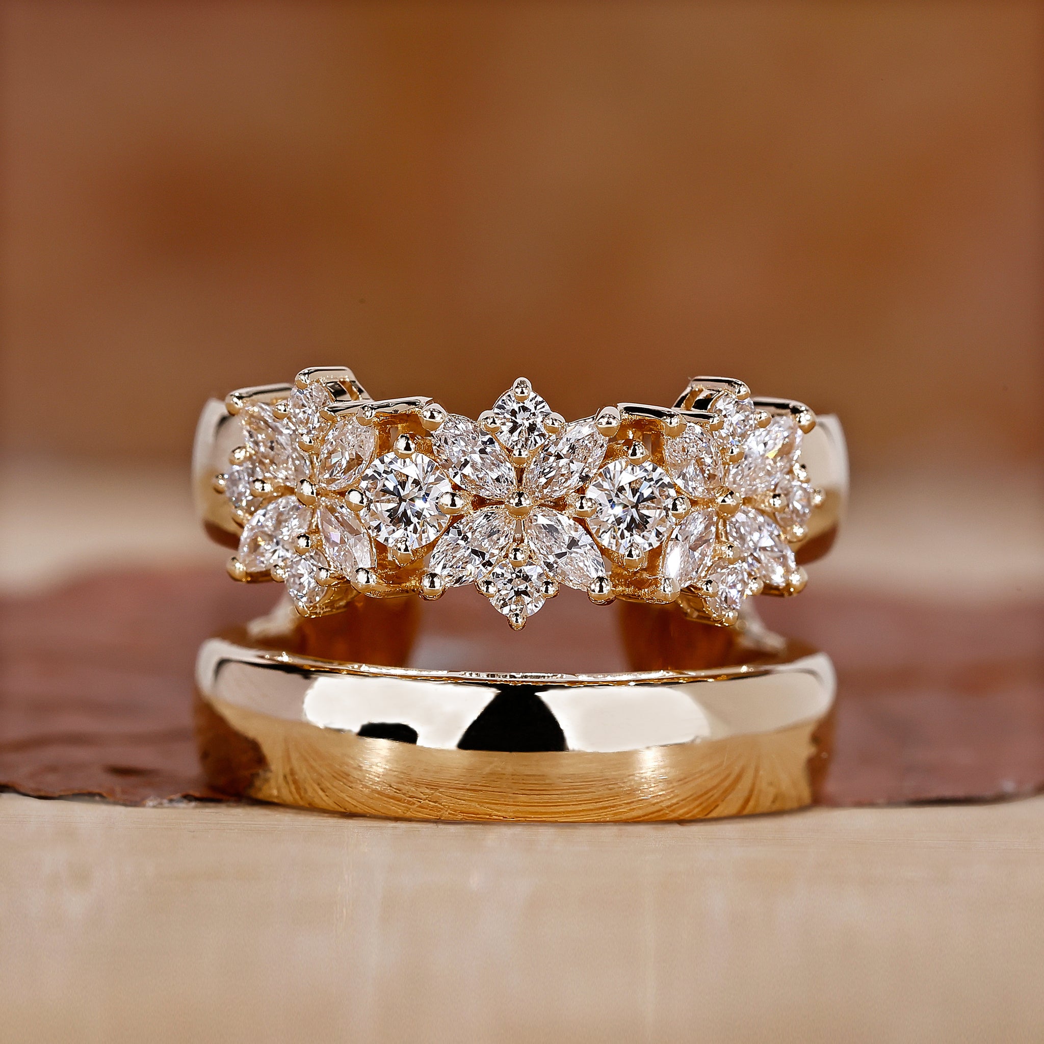 Marquise and round engagement ring with double layer gold ring.
