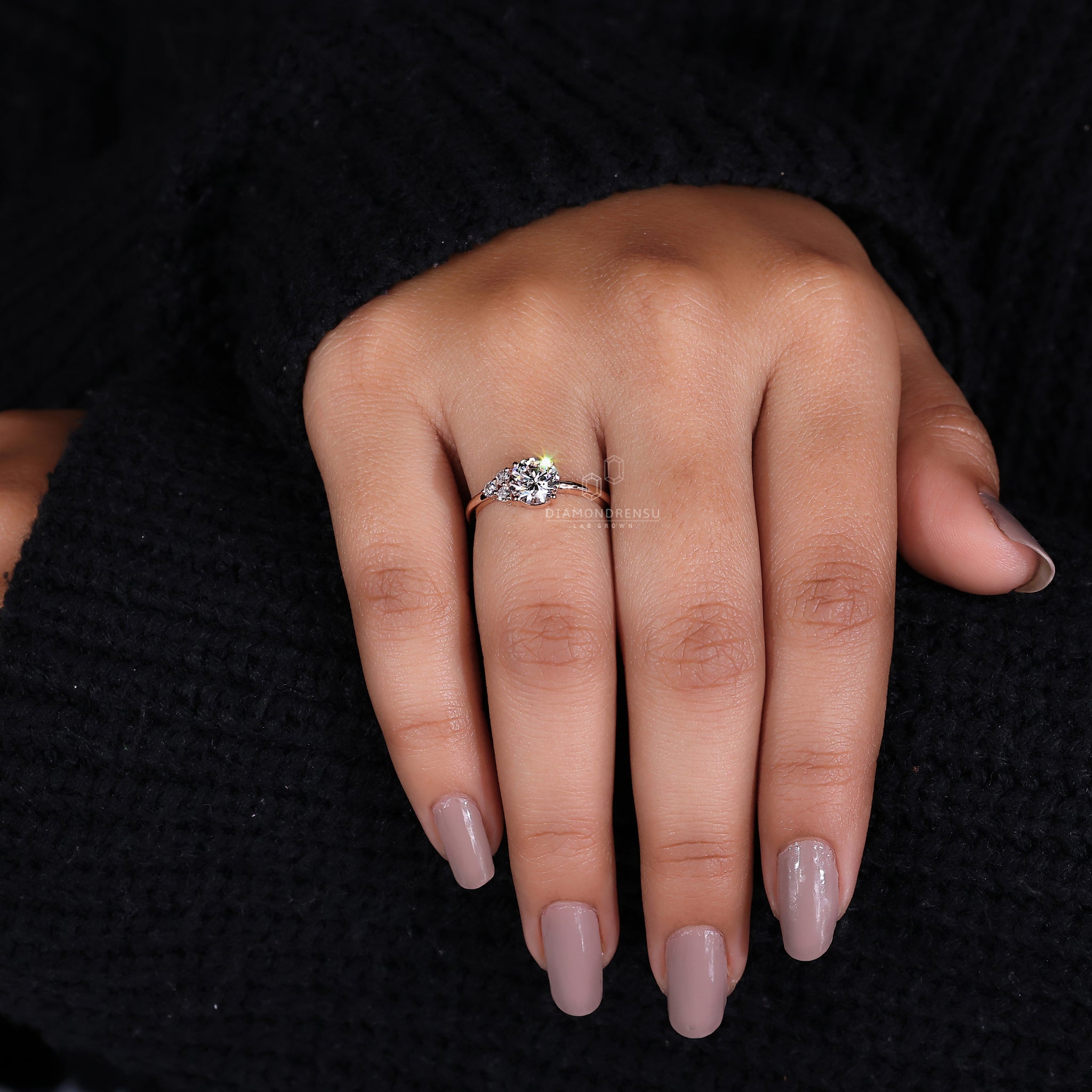 Rose gold ring with lab grown diamond and handmade finish.
