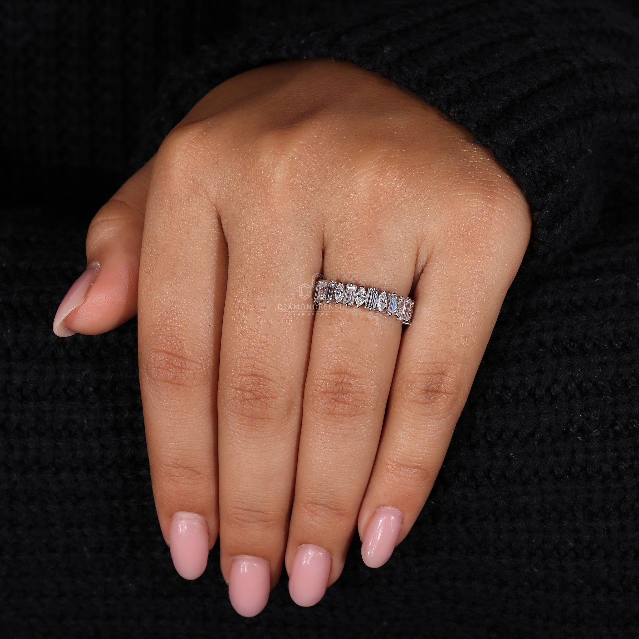 Wedding band with marquise and baguette diamonds.
