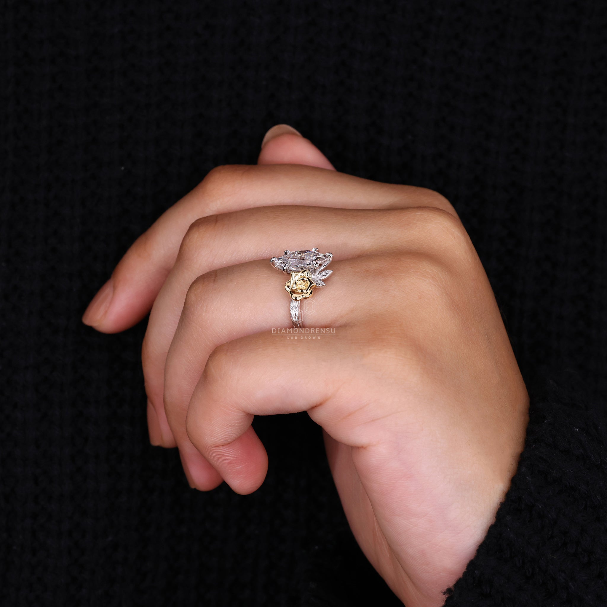 Custom engagement ring with six claw prong set and nature inspired style.
